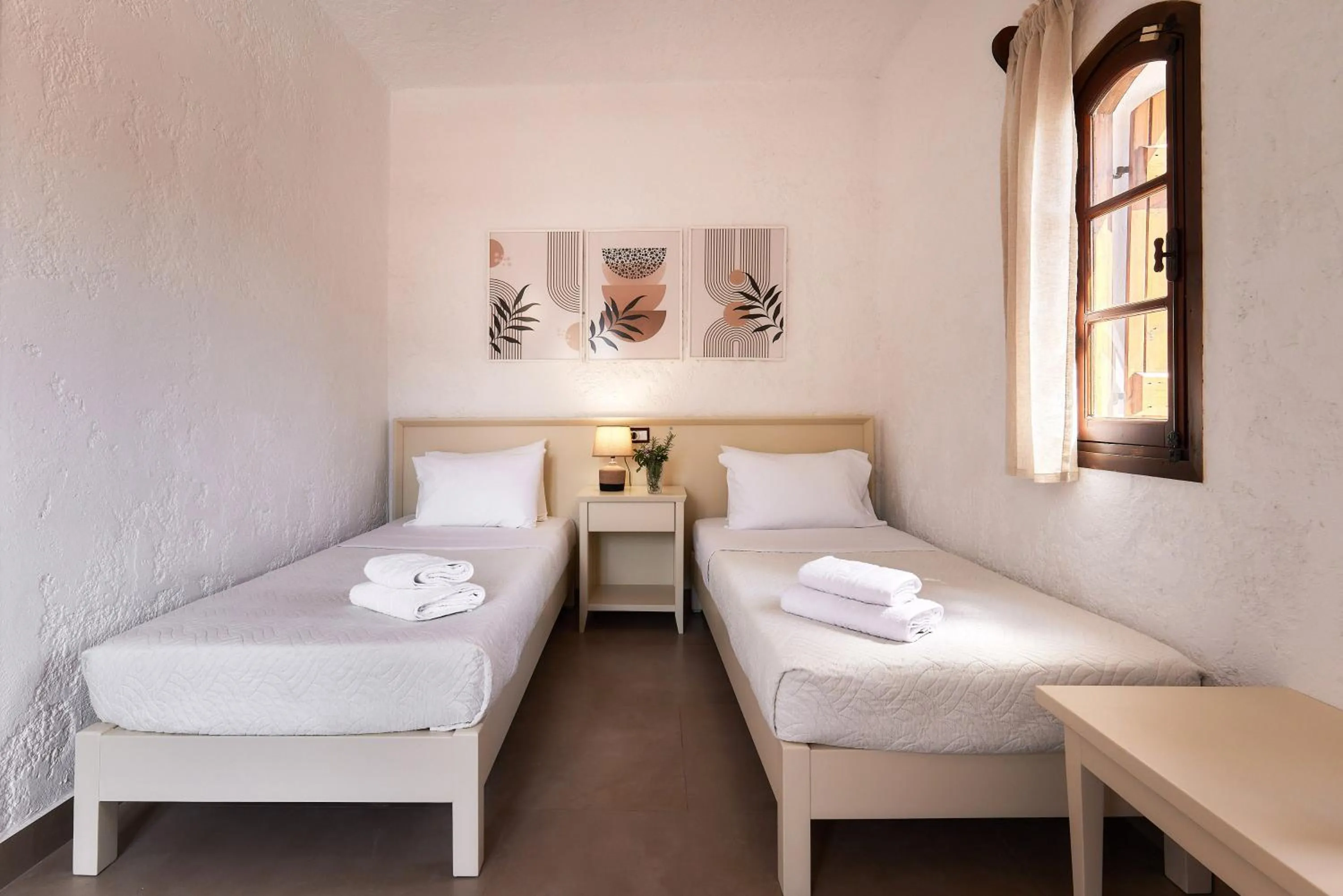 Bed in Mila Malia Studios Hotel