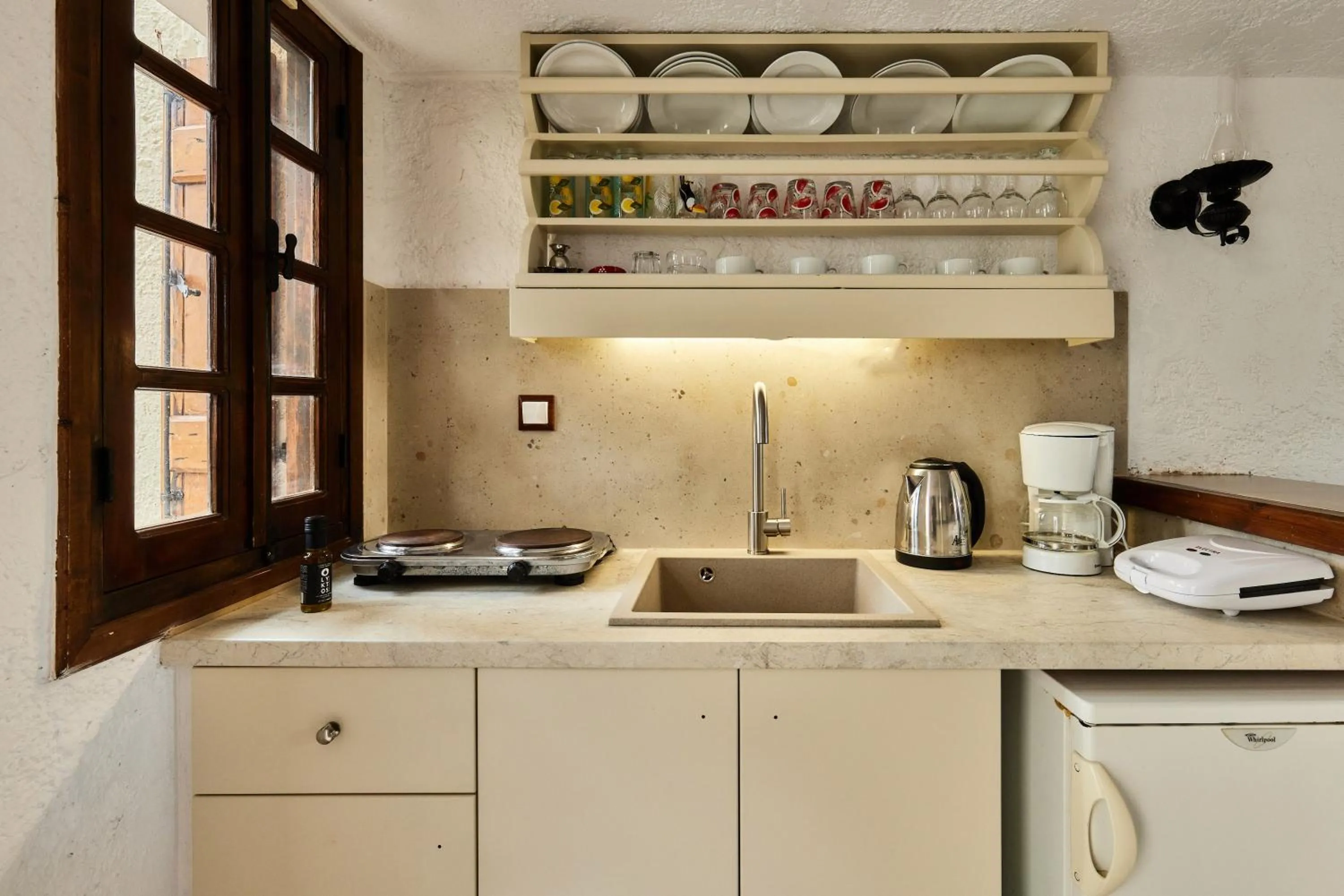 kitchen in Mila Malia Studios Hotel