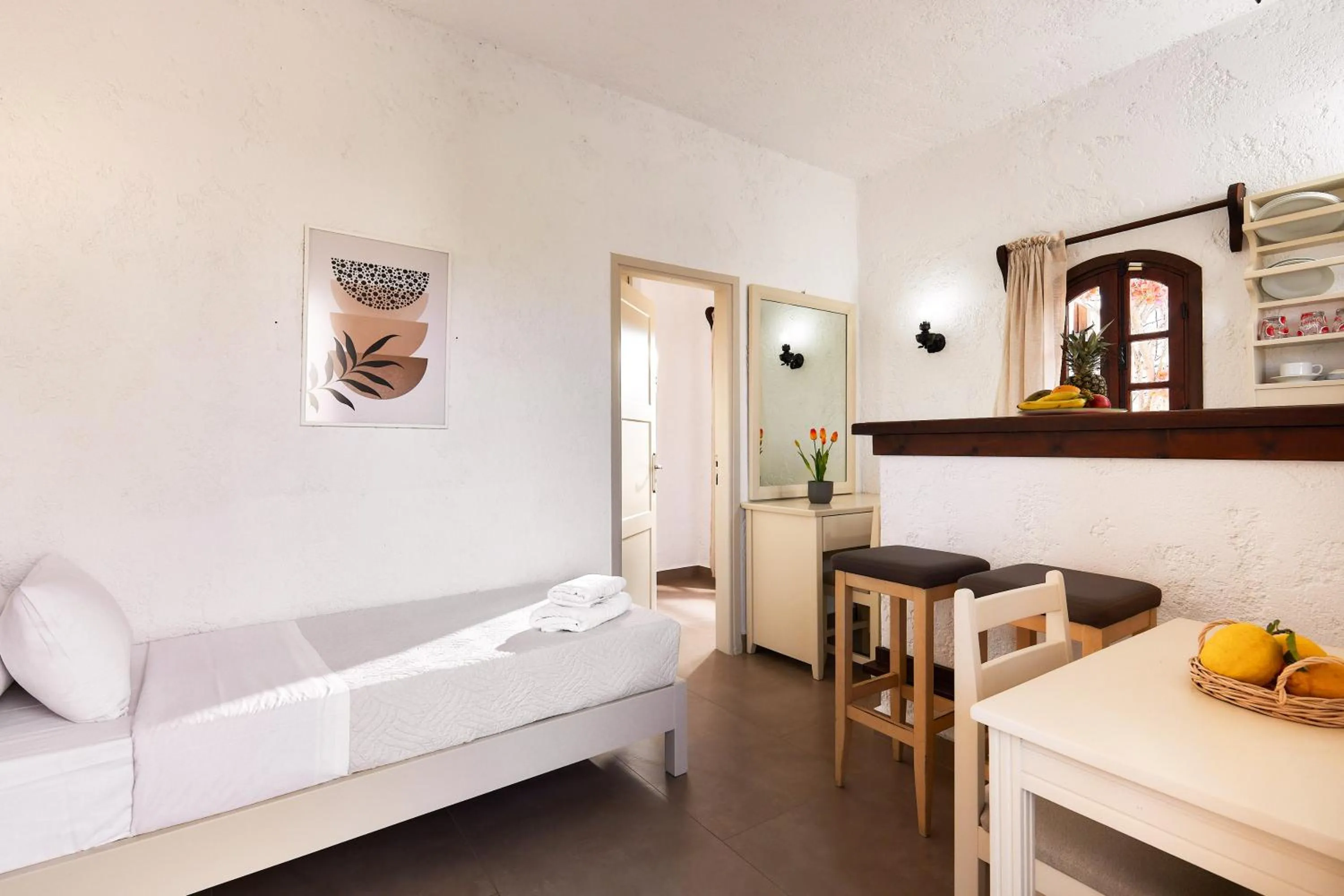 Bed in Mila Malia Studios Hotel