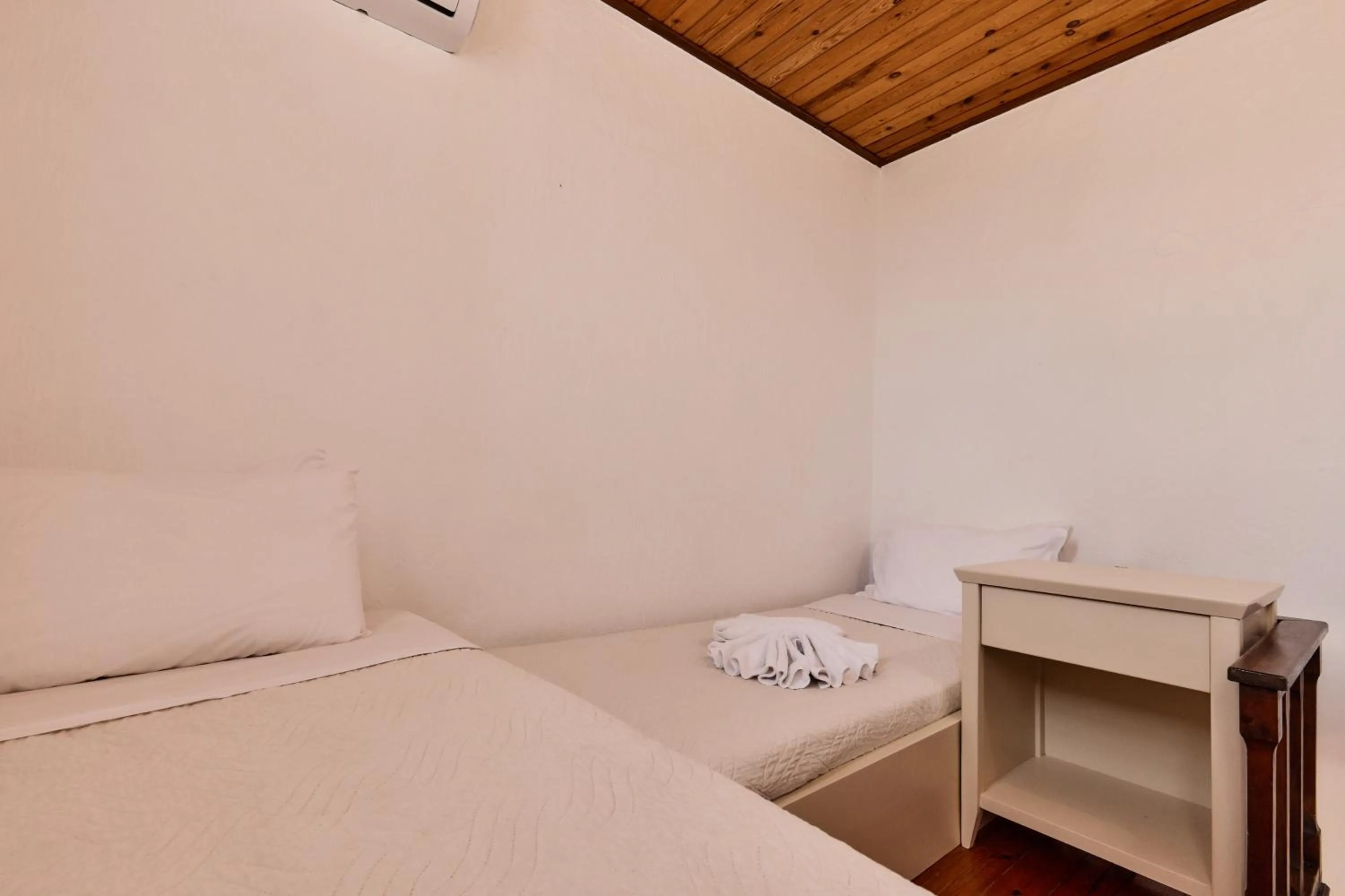 Bed in Mila Malia Studios Hotel