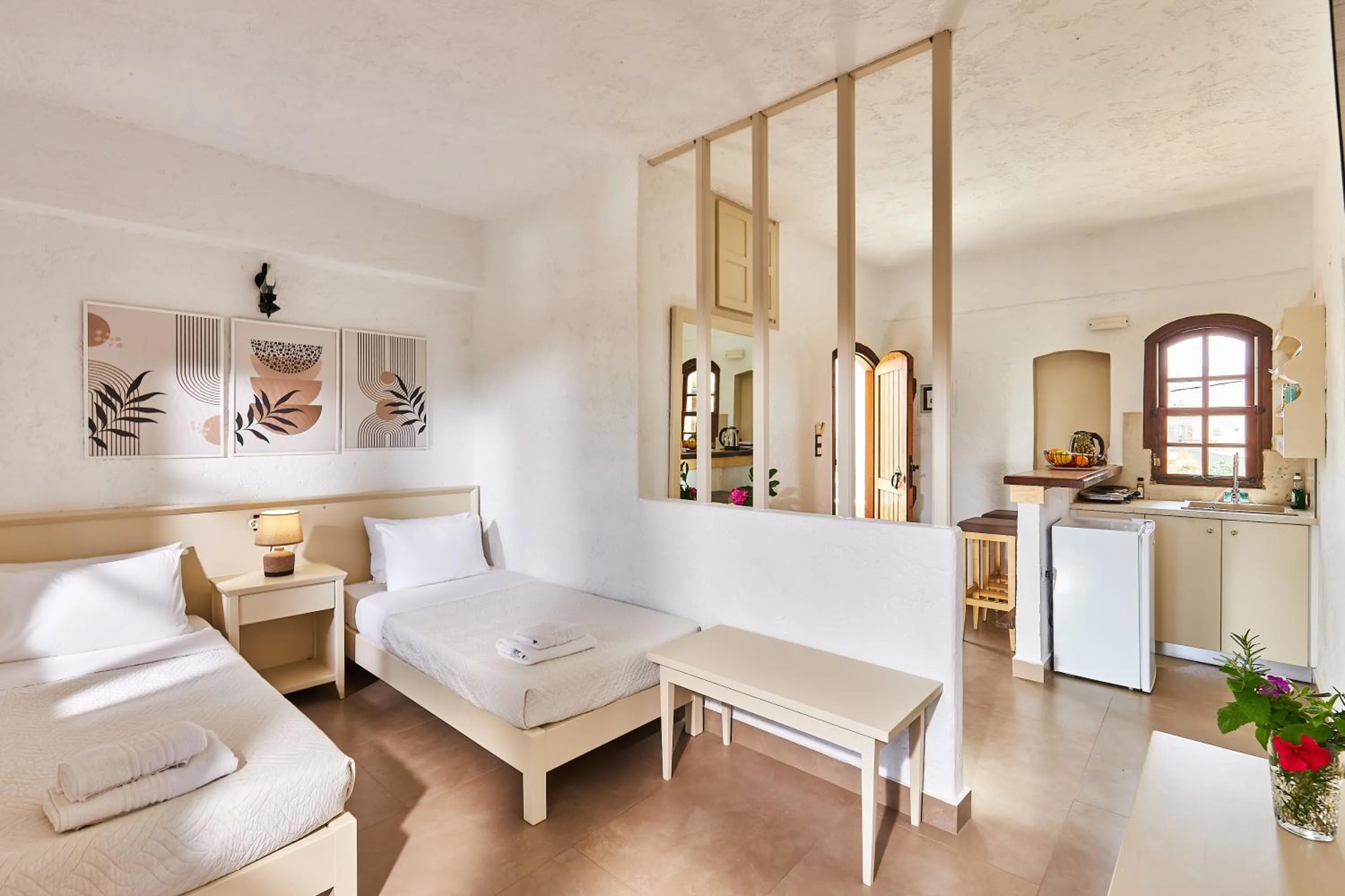 Bed in Mila Malia Studios Hotel