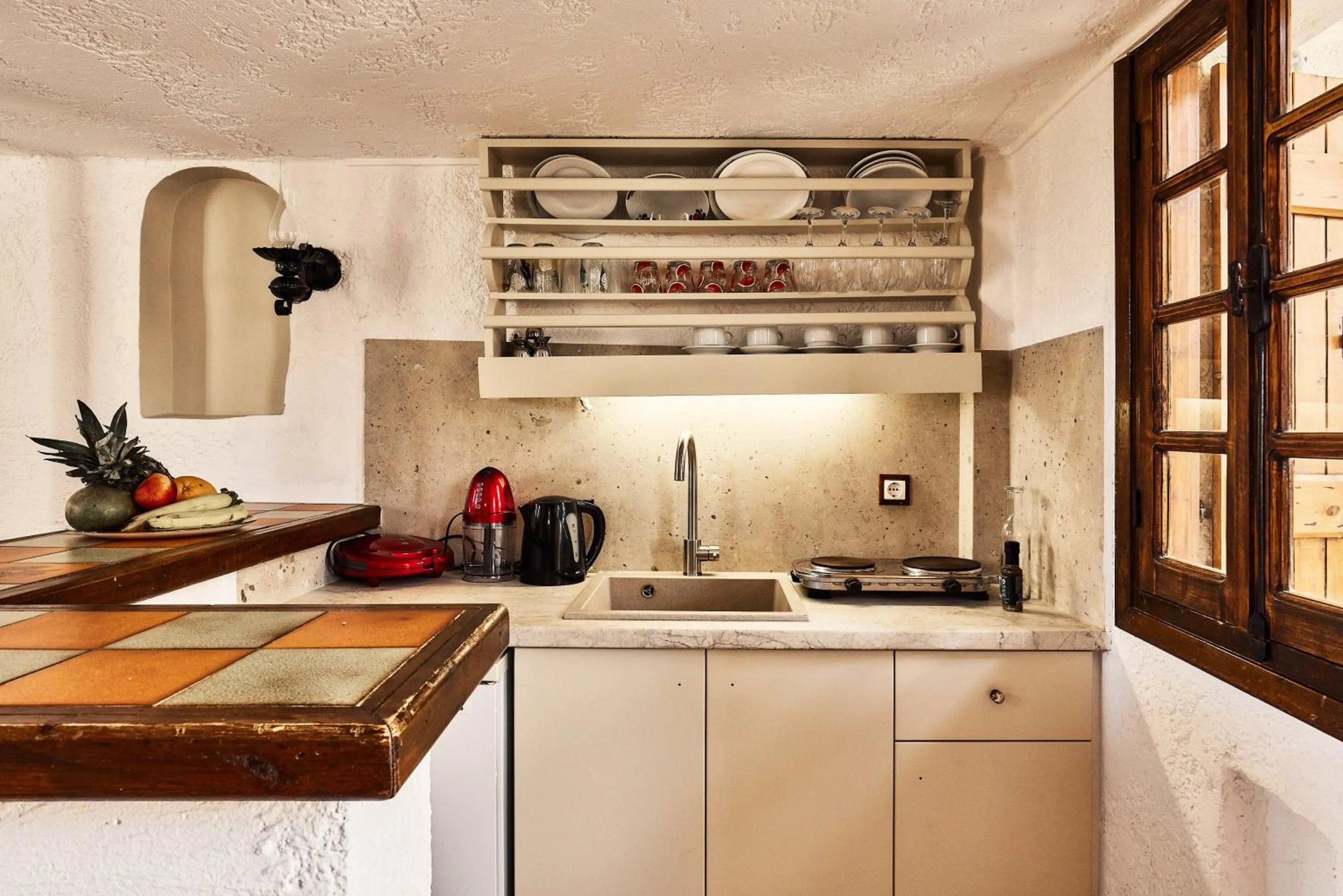 kitchen in Mila Malia Studios Hotel