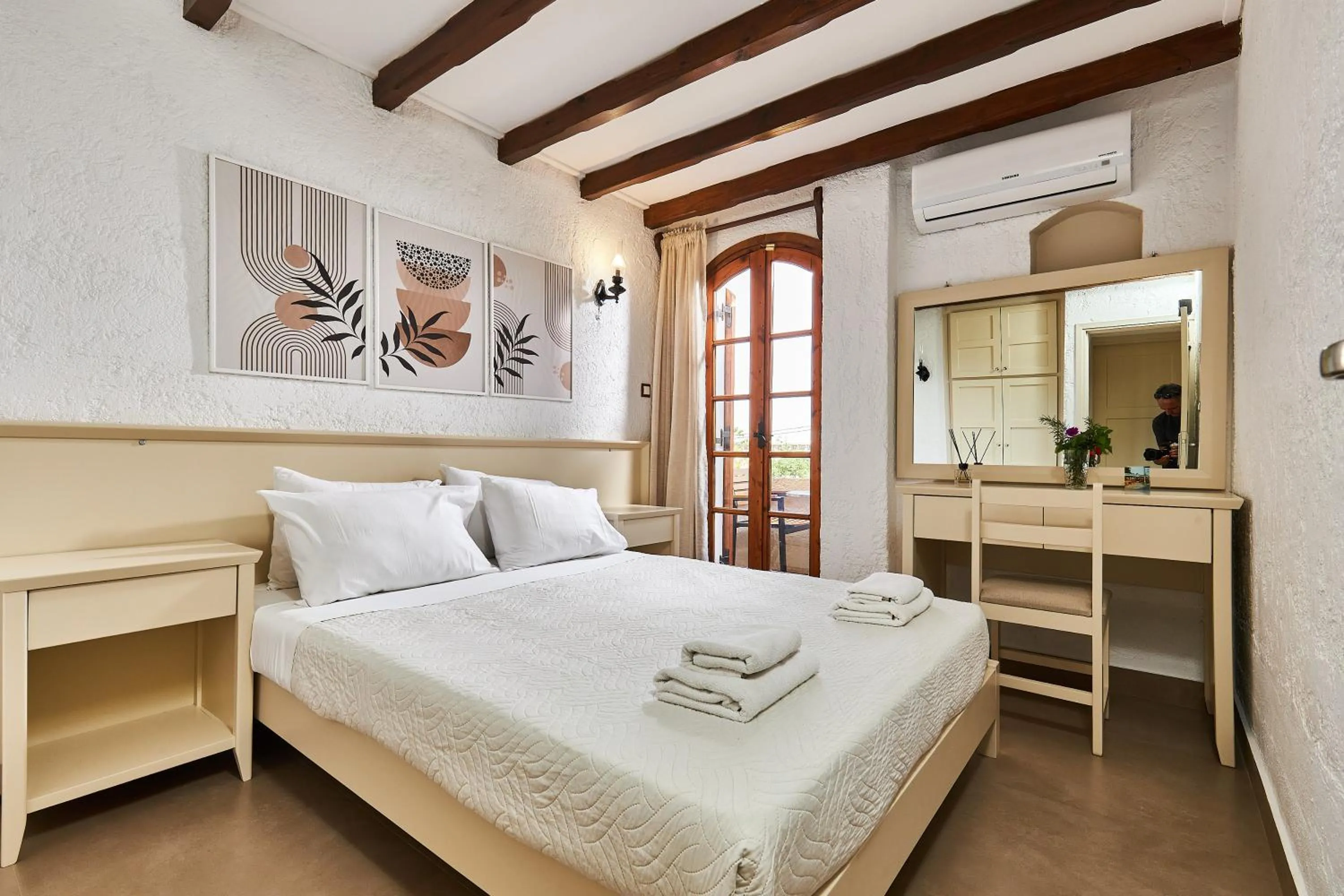 Bed in Mila Malia Studios Hotel