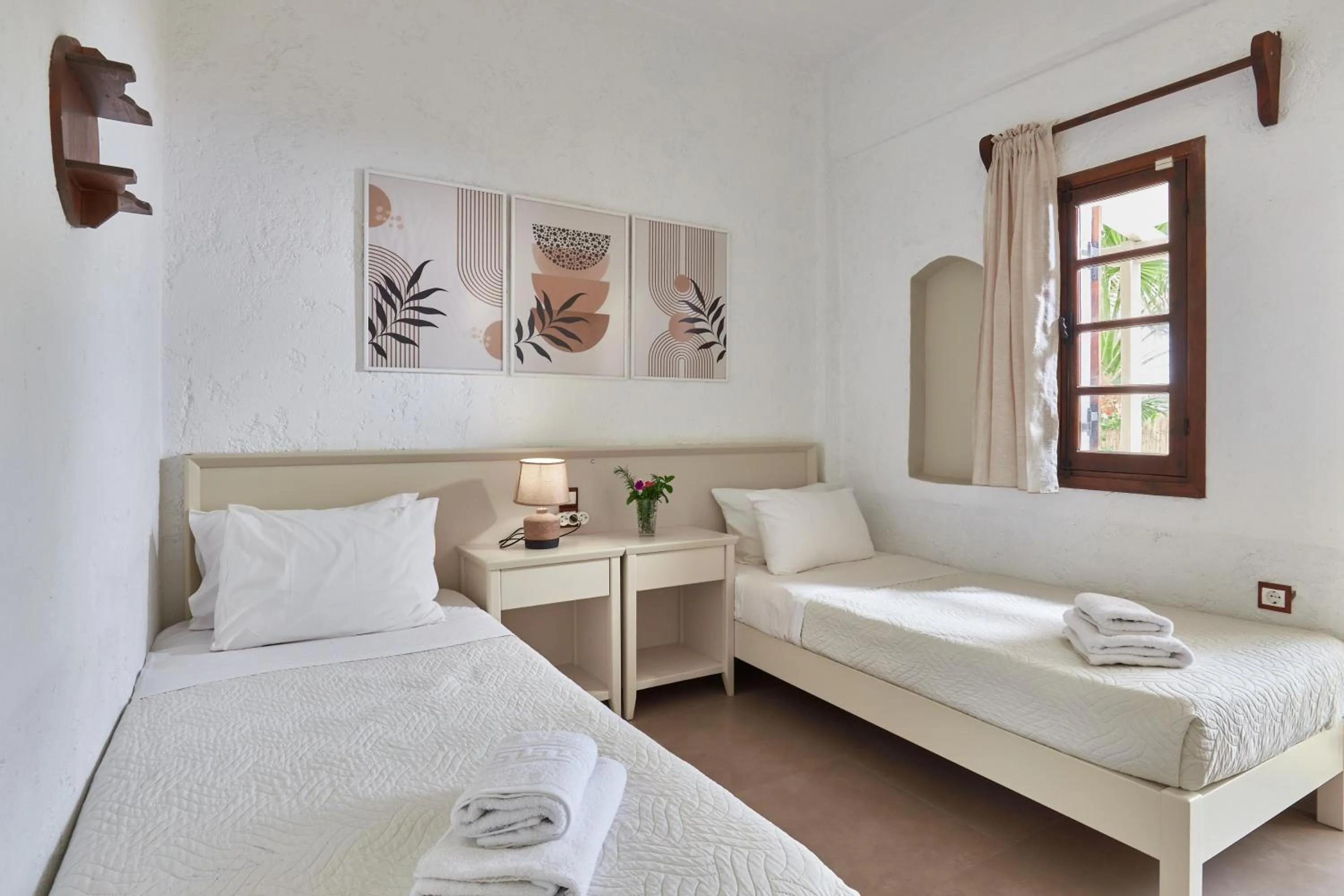 Bed in Mila Malia Studios Hotel