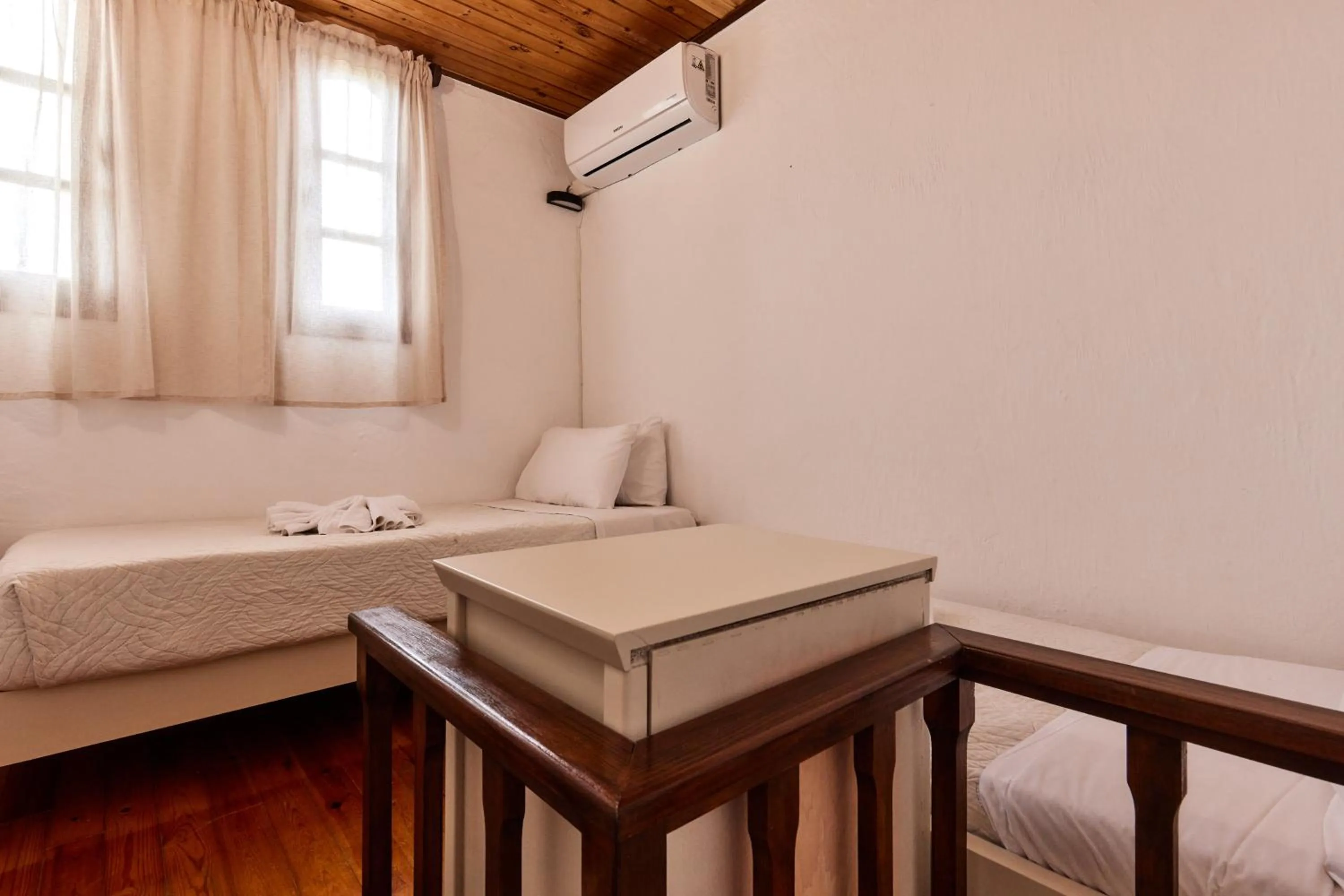 Bed in Mila Malia Studios Hotel