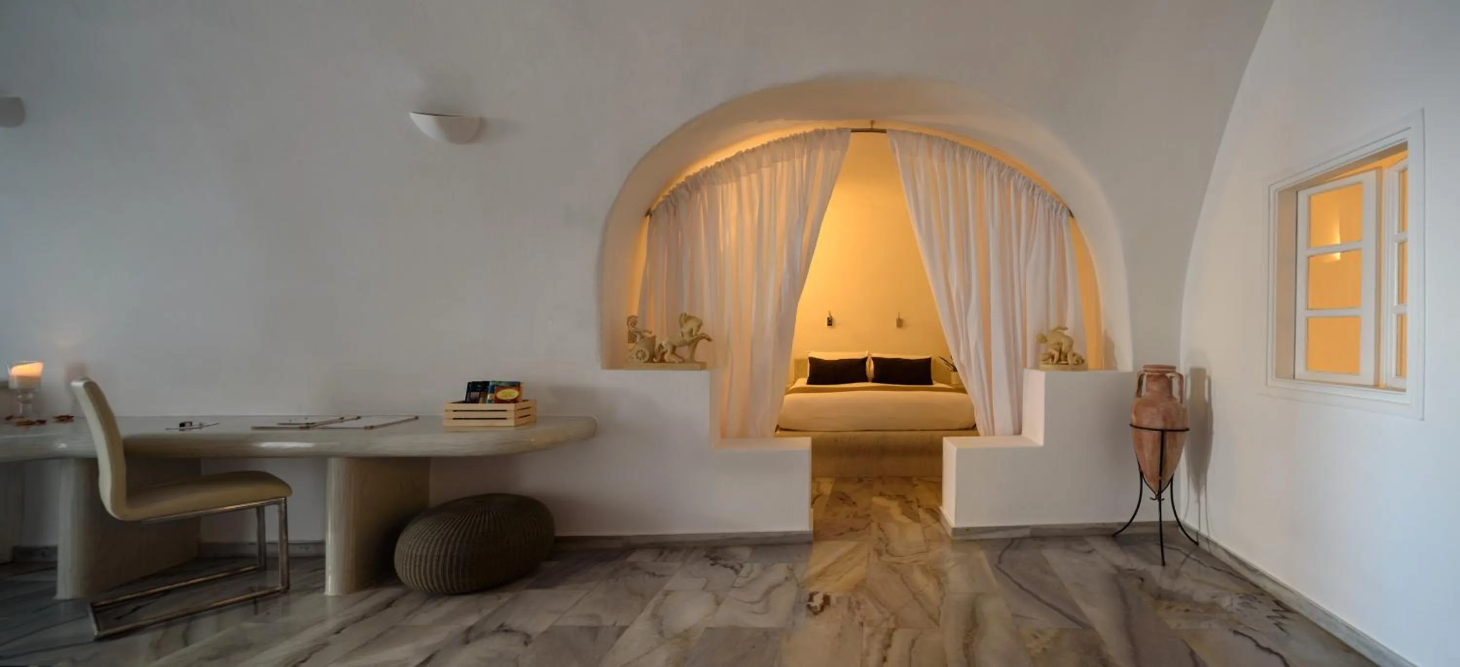 Bed in Pegasus Suites & Spa