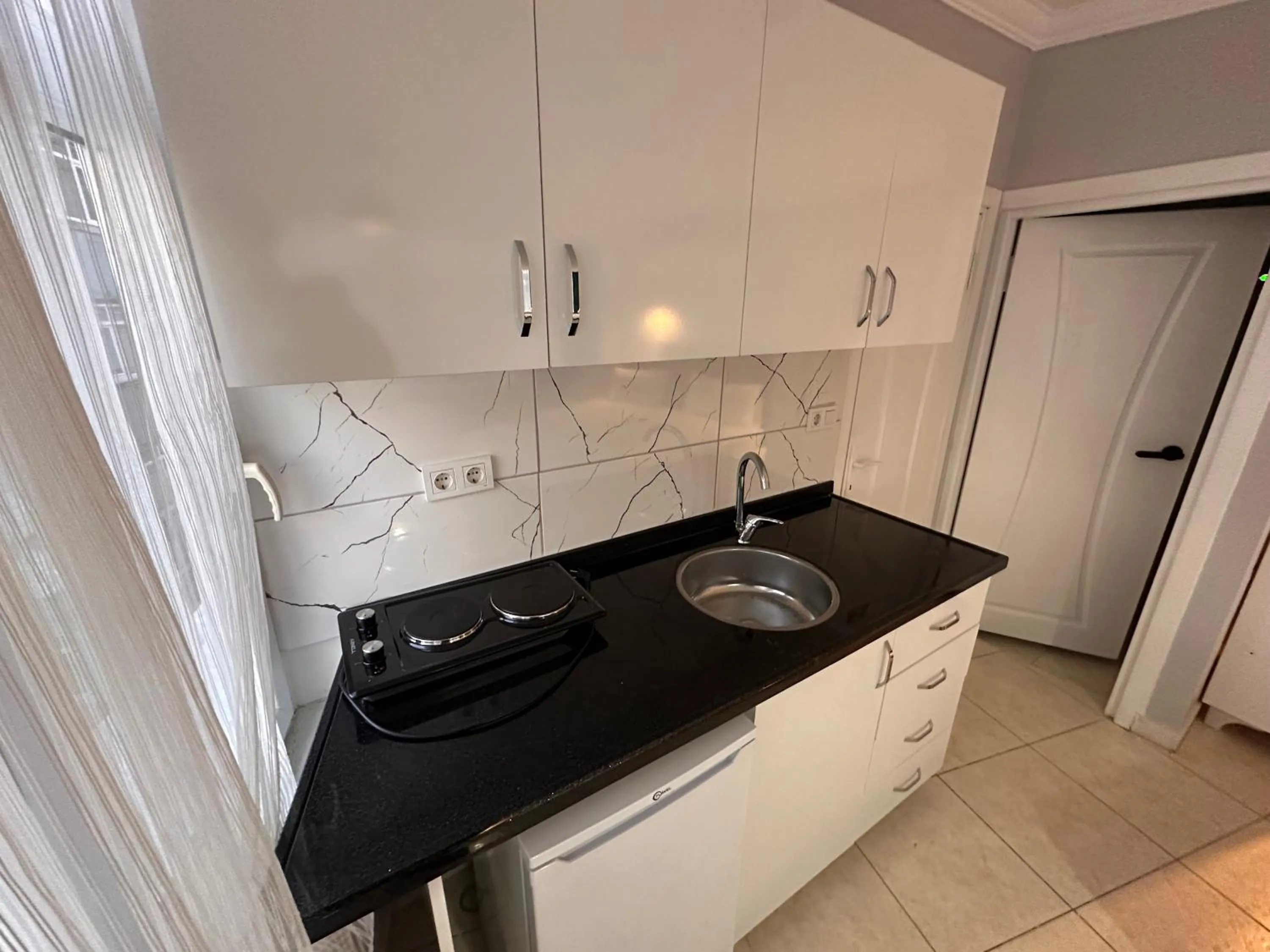 Kitchen or kitchenette in Asparagus HOTEL & SUITES OLD CITY