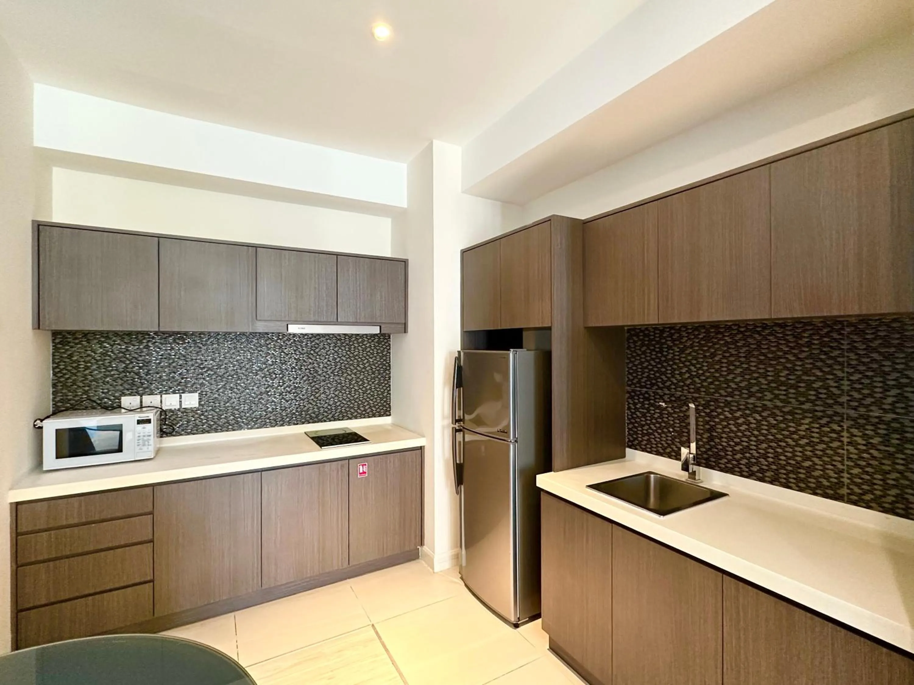 Kitchen or kitchenette in M Centro City Centre @ Gaya Street by Sunset Seaview Vacation Condos