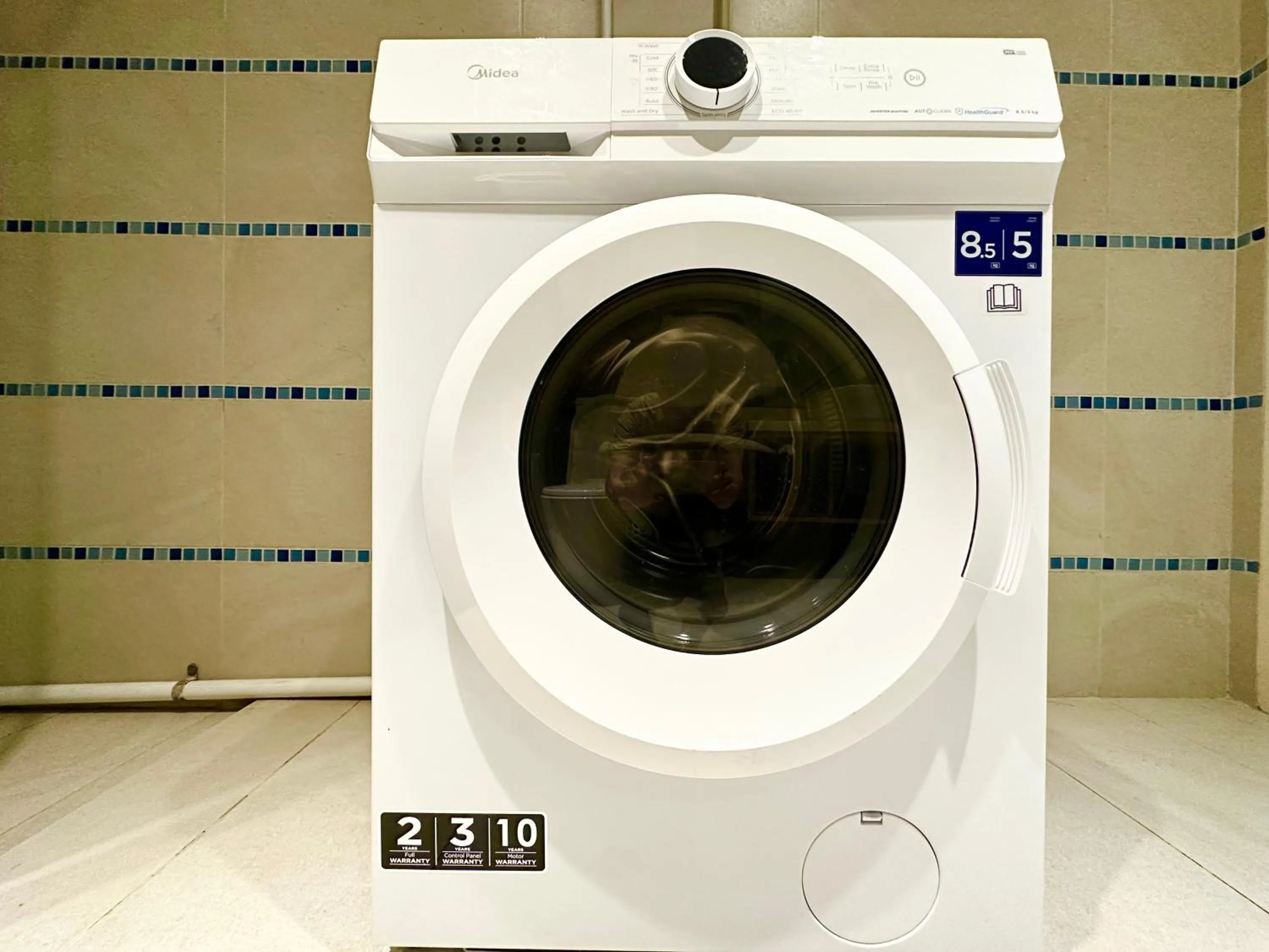 washing machine in M Centro City Centre @ Gaya Street by Sunset Seaview Vacation Condos