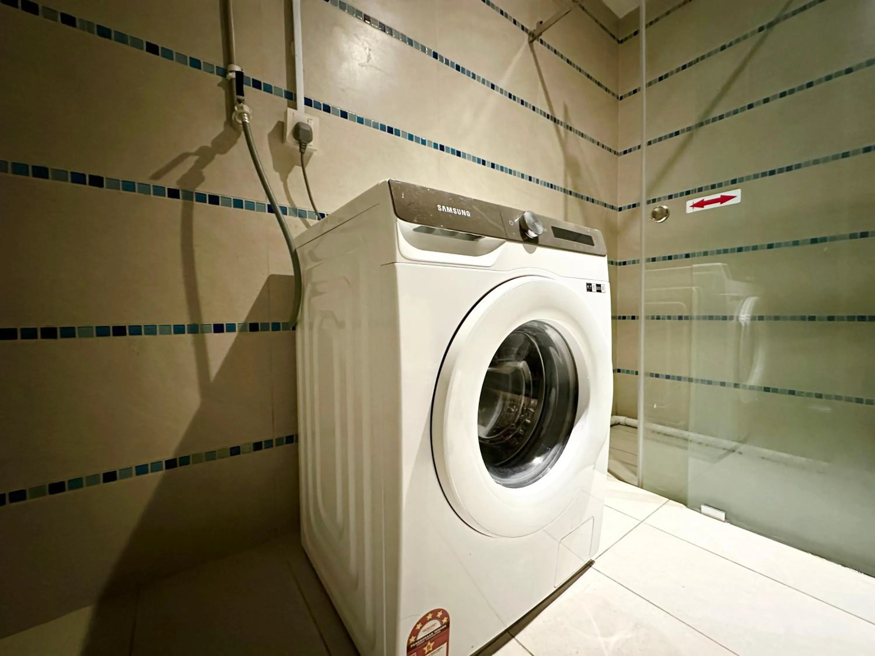 washing machine in M Centro City Centre @ Gaya Street by Sunset Seaview Vacation Condos