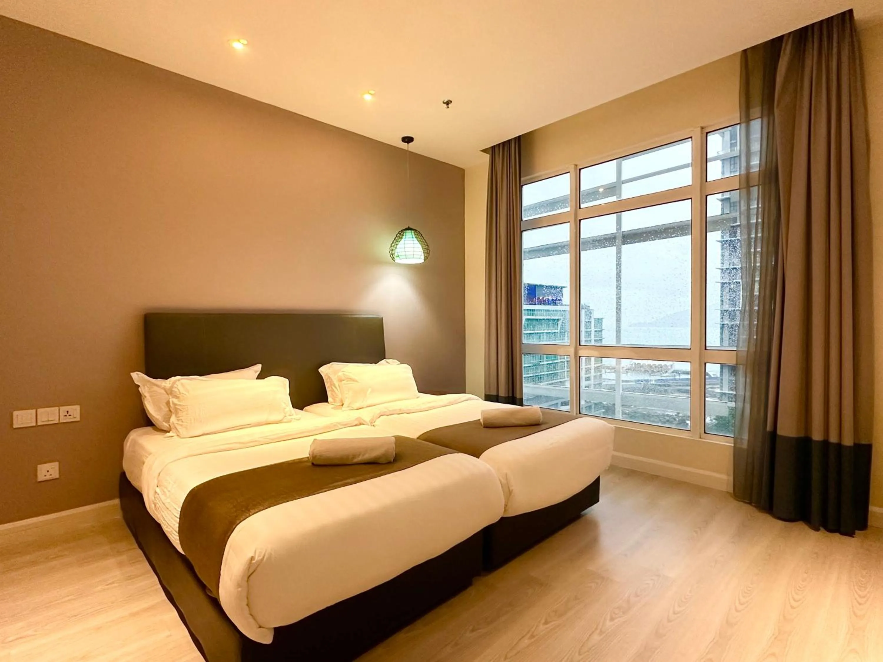 Bed in M Centro City Centre @ Gaya Street by Sunset Seaview Vacation Condos