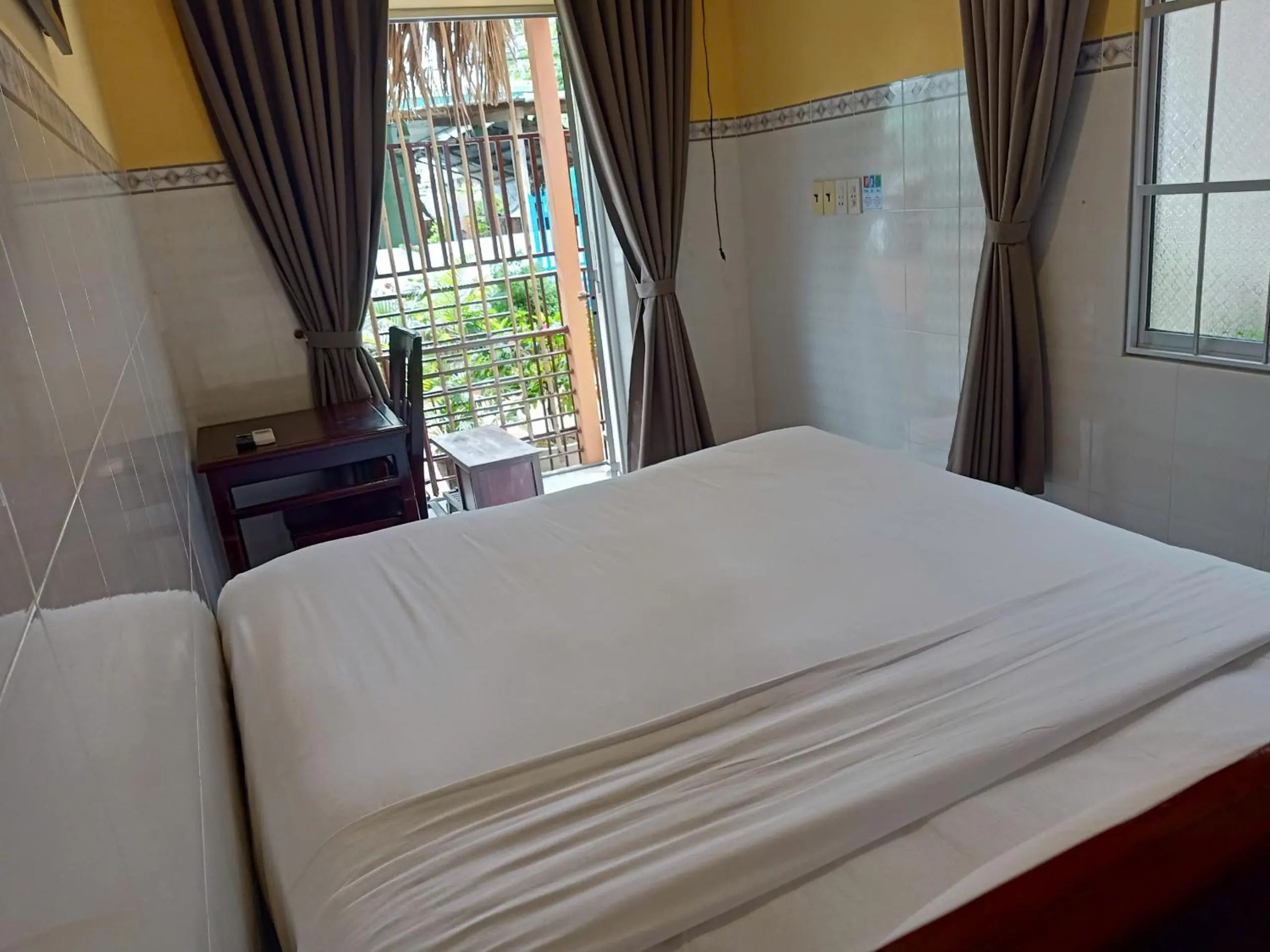 Bed in Mi Nhon Em Hotel Muine