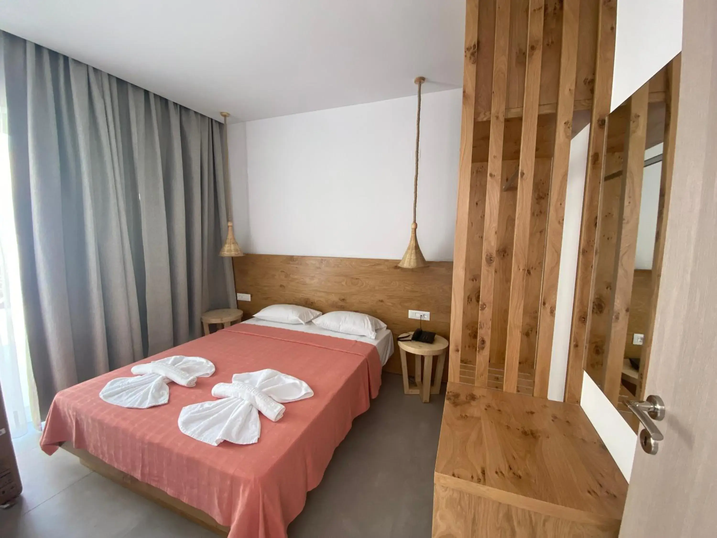 Bedroom, Bed in Blue Aegean Hotel & Suites Bedroom, Bed in Blue Aegean Hotel & Suites