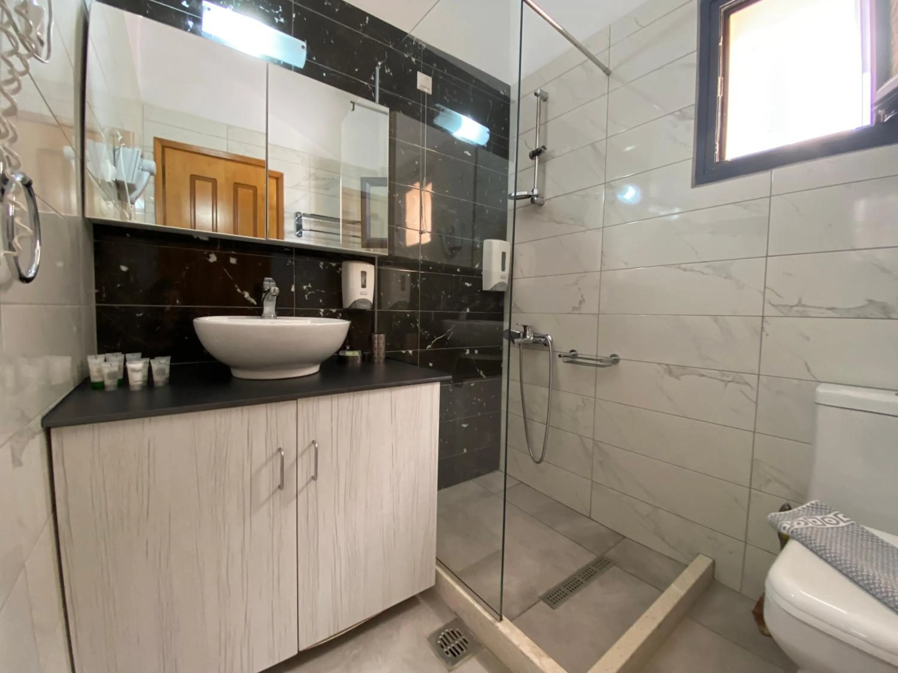 Bathroom in Blue Aegean Hotel & Suites