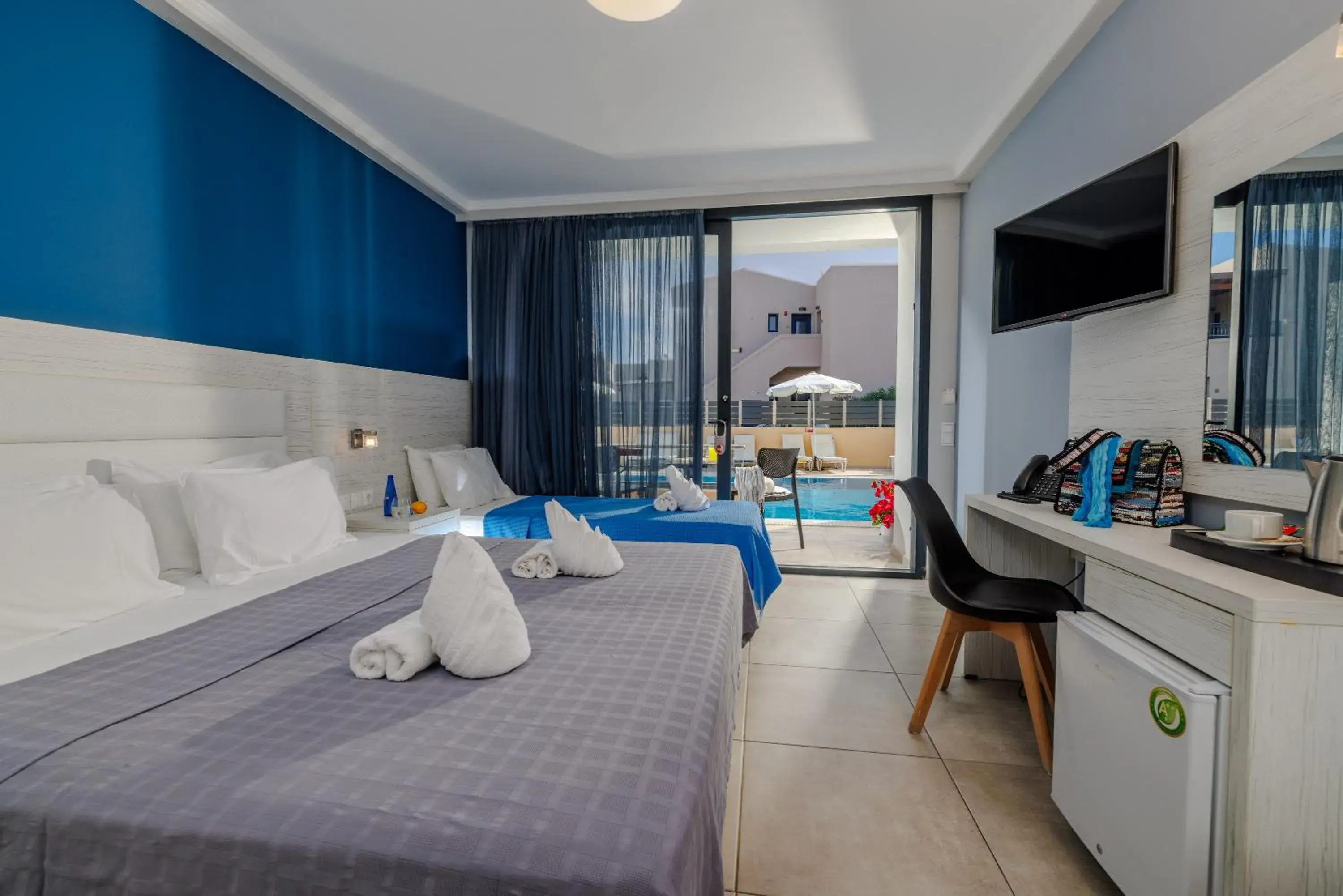 Bedroom, Bed in Blue Aegean Hotel & Suites Bedroom, Bed in Blue Aegean Hotel & Suites