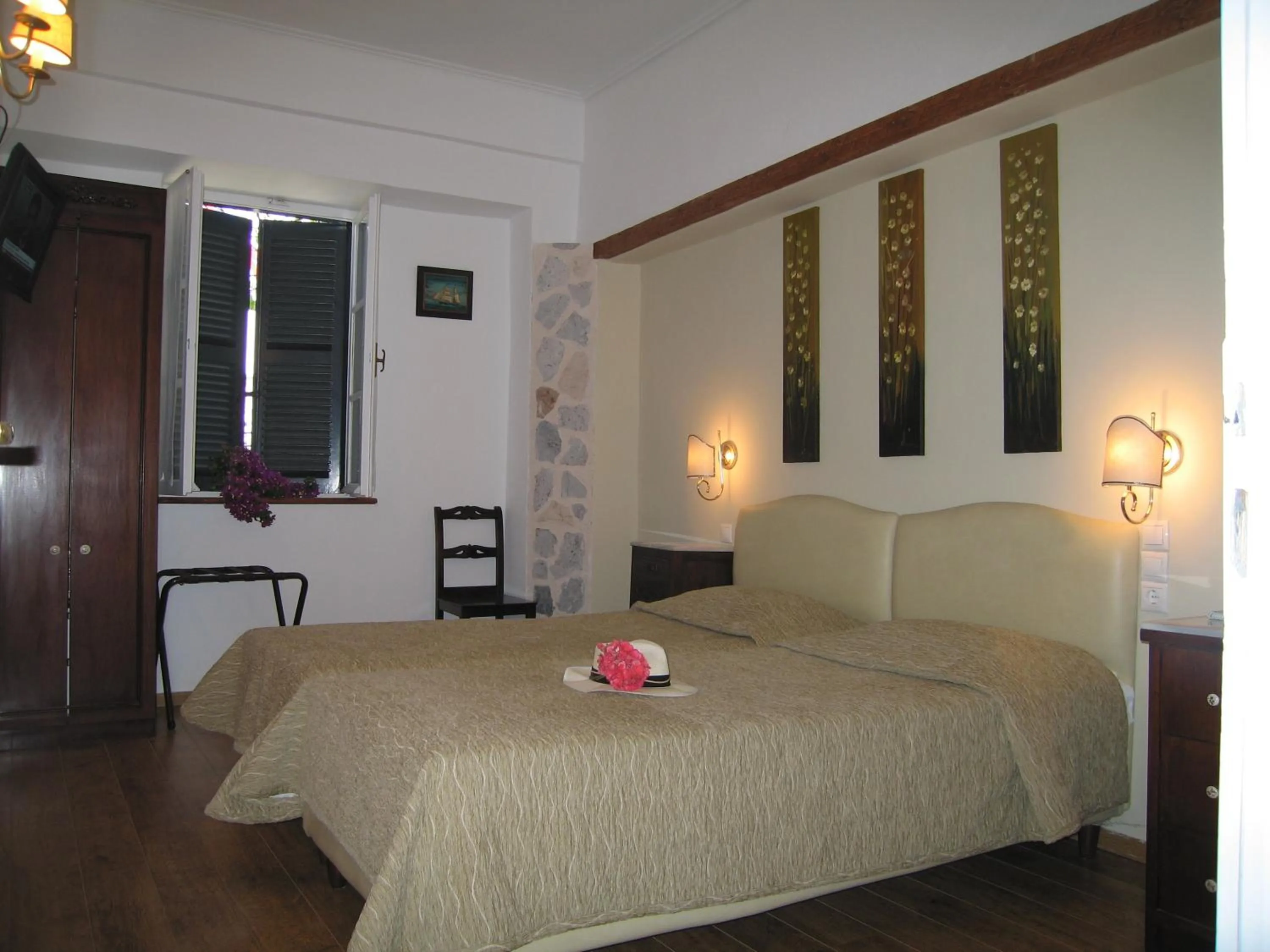 Bed in Mistral Hotel