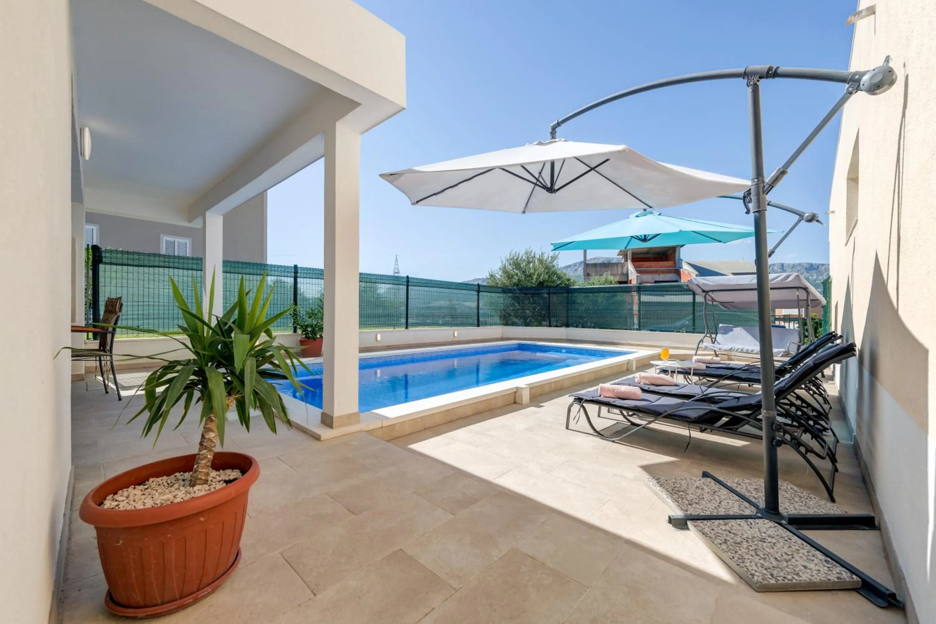 Swimming pool in Apartment Renata + PRIVATE swimming pool in SPLIT