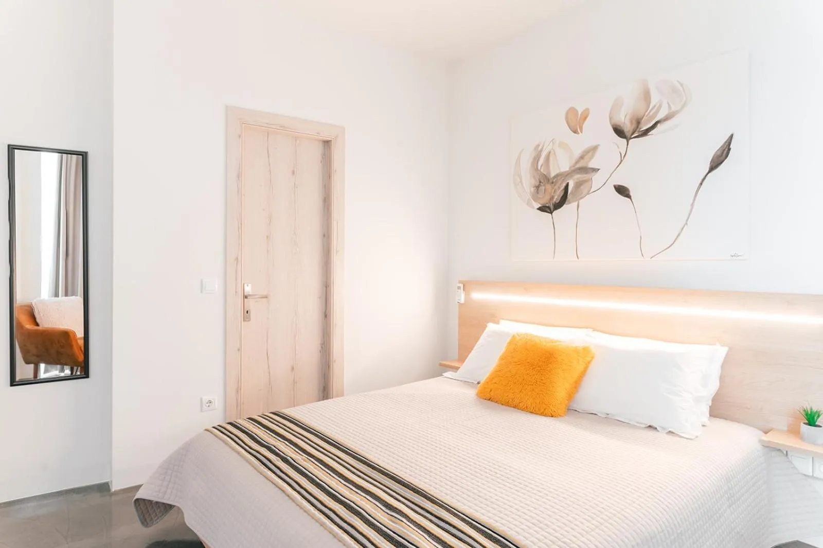 Bed in MAGNOLIA SUITES