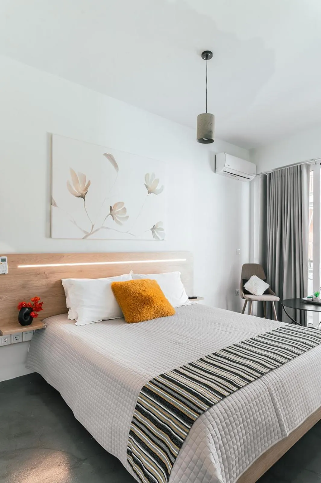 Bed in MAGNOLIA SUITES