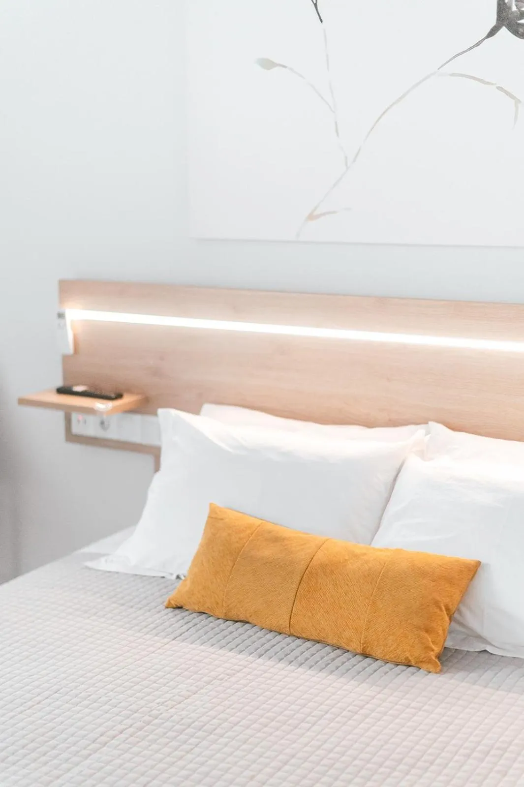 Bed in MAGNOLIA SUITES