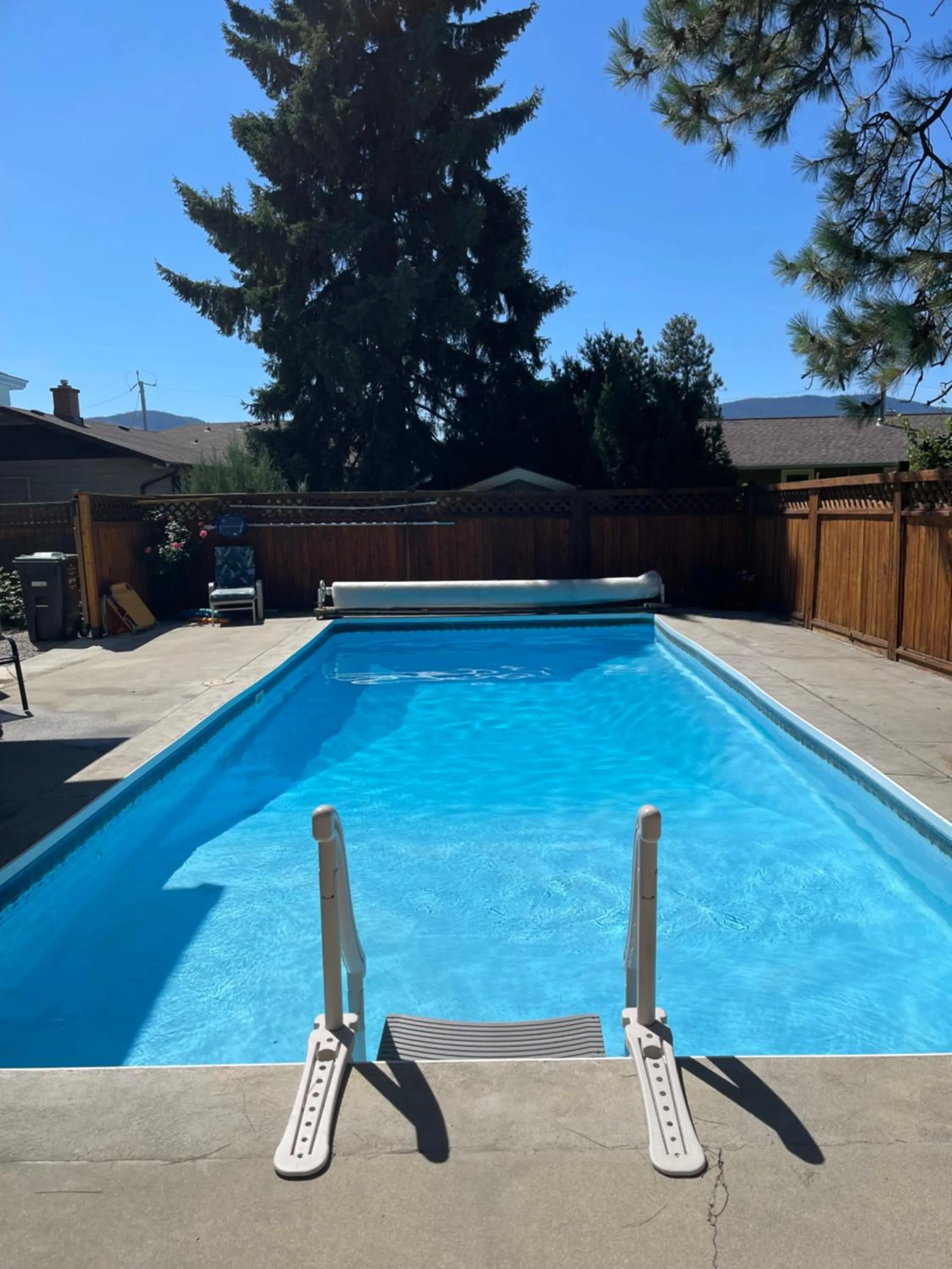 Bright poolside walkout two bedroom basement suite in the Okanagan