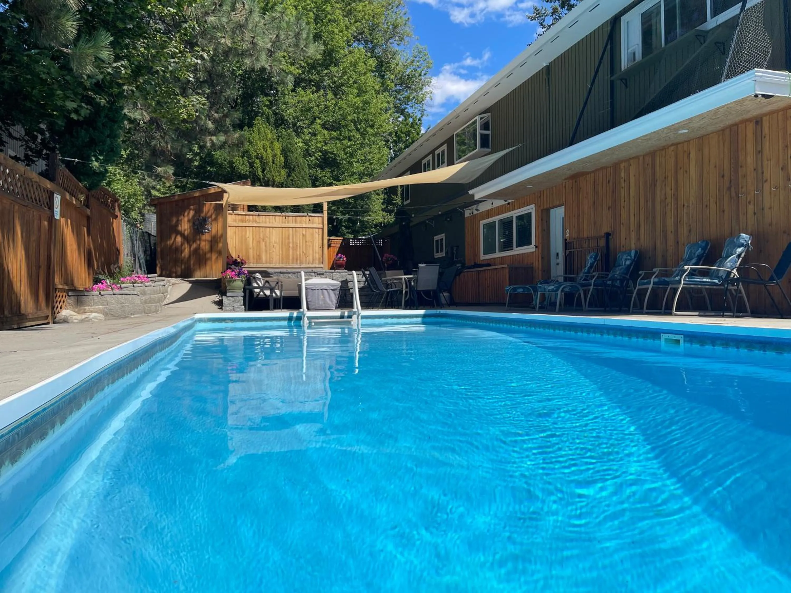 Bright poolside walkout two bedroom basement suite in the Okanagan