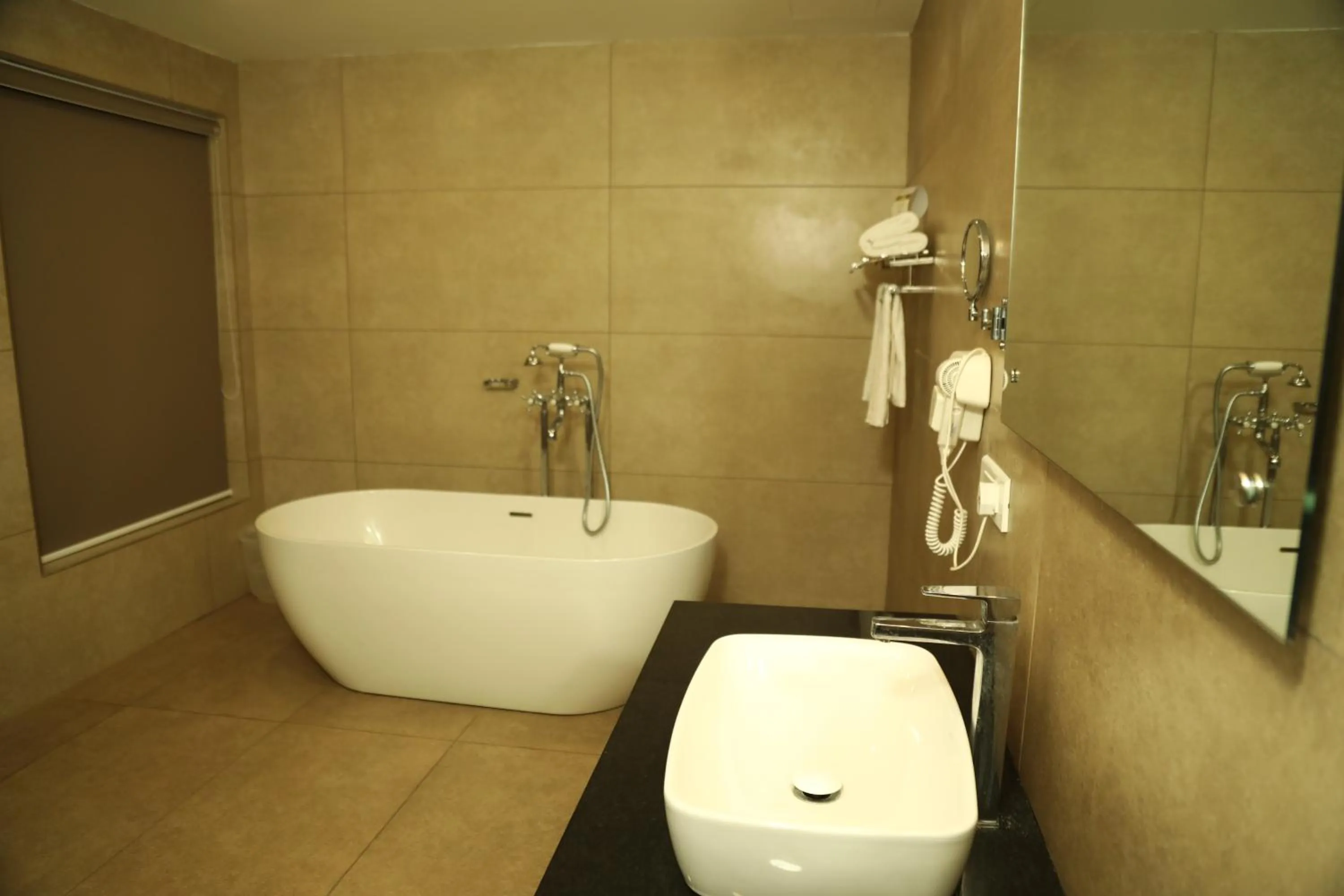 Bathroom in MARIYALAYAM MUNROE ISLAND RESIDENCY