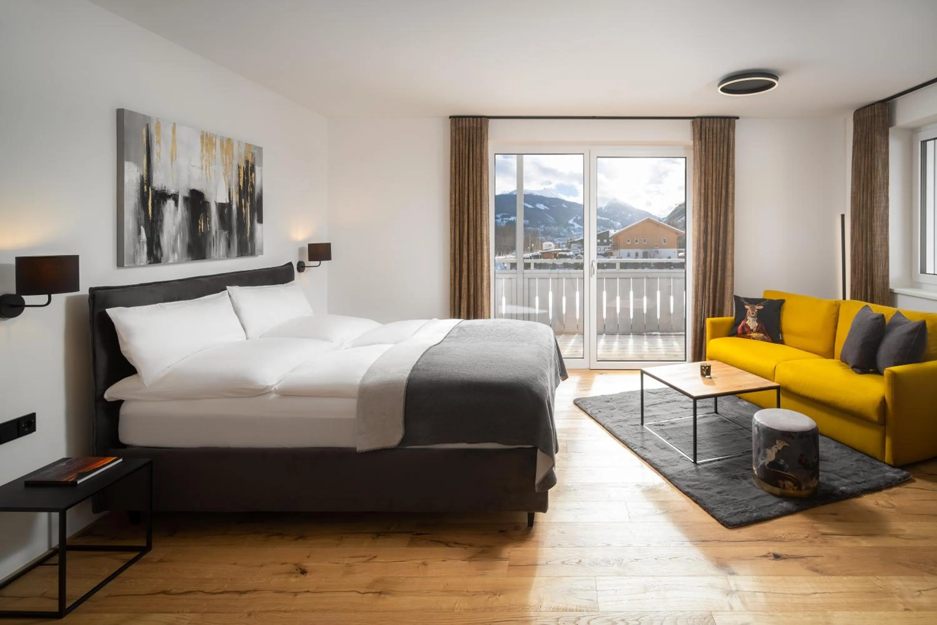 Living room, Bed in Auhof - Apartments Bad Gastein