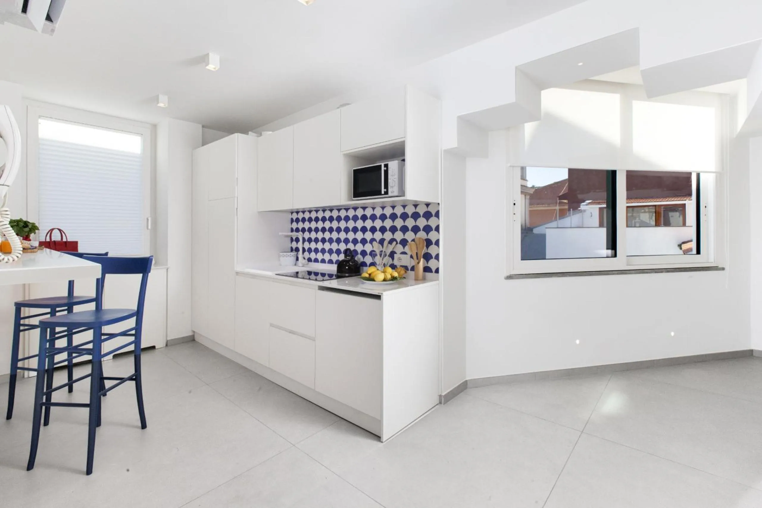 Kitchen or kitchenette in AMORE RENTALS - Appartamento Luis 2 11