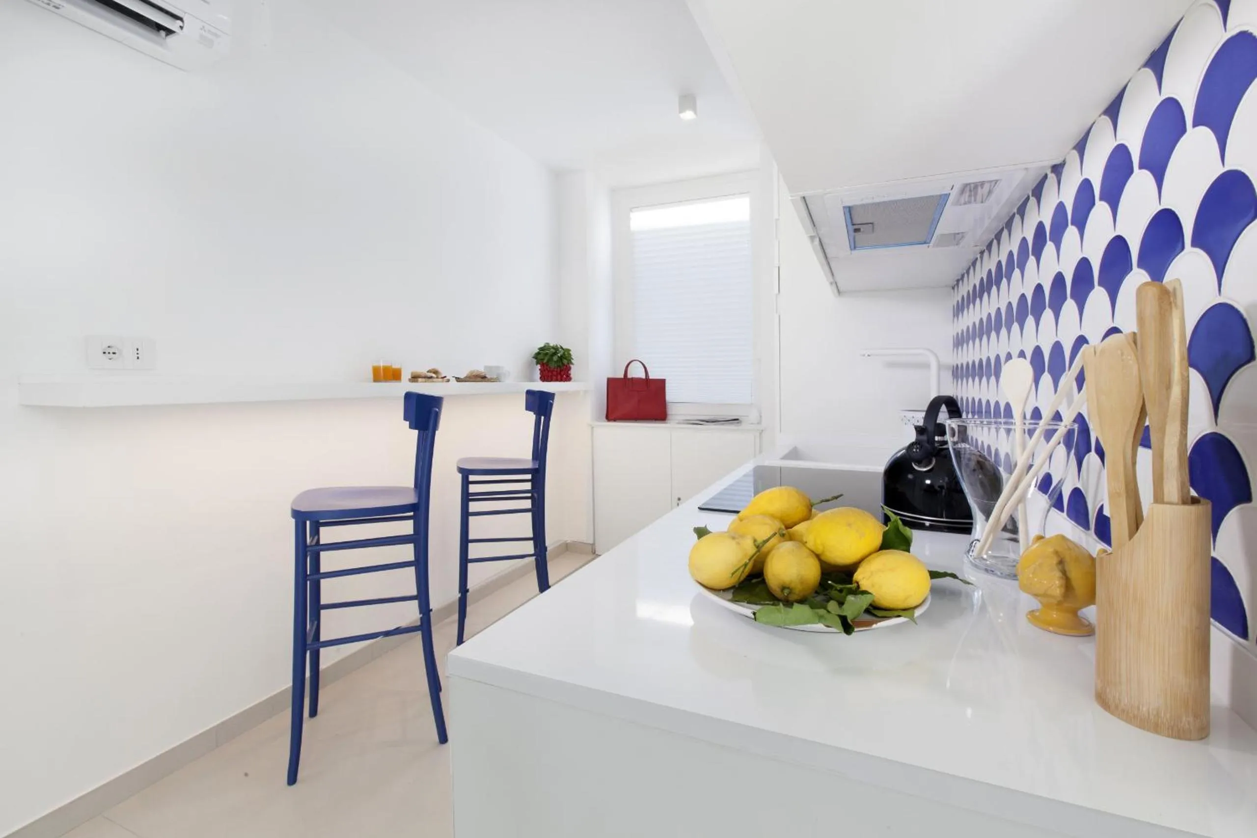 Kitchen or kitchenette in AMORE RENTALS - Appartamento Luis 2 11