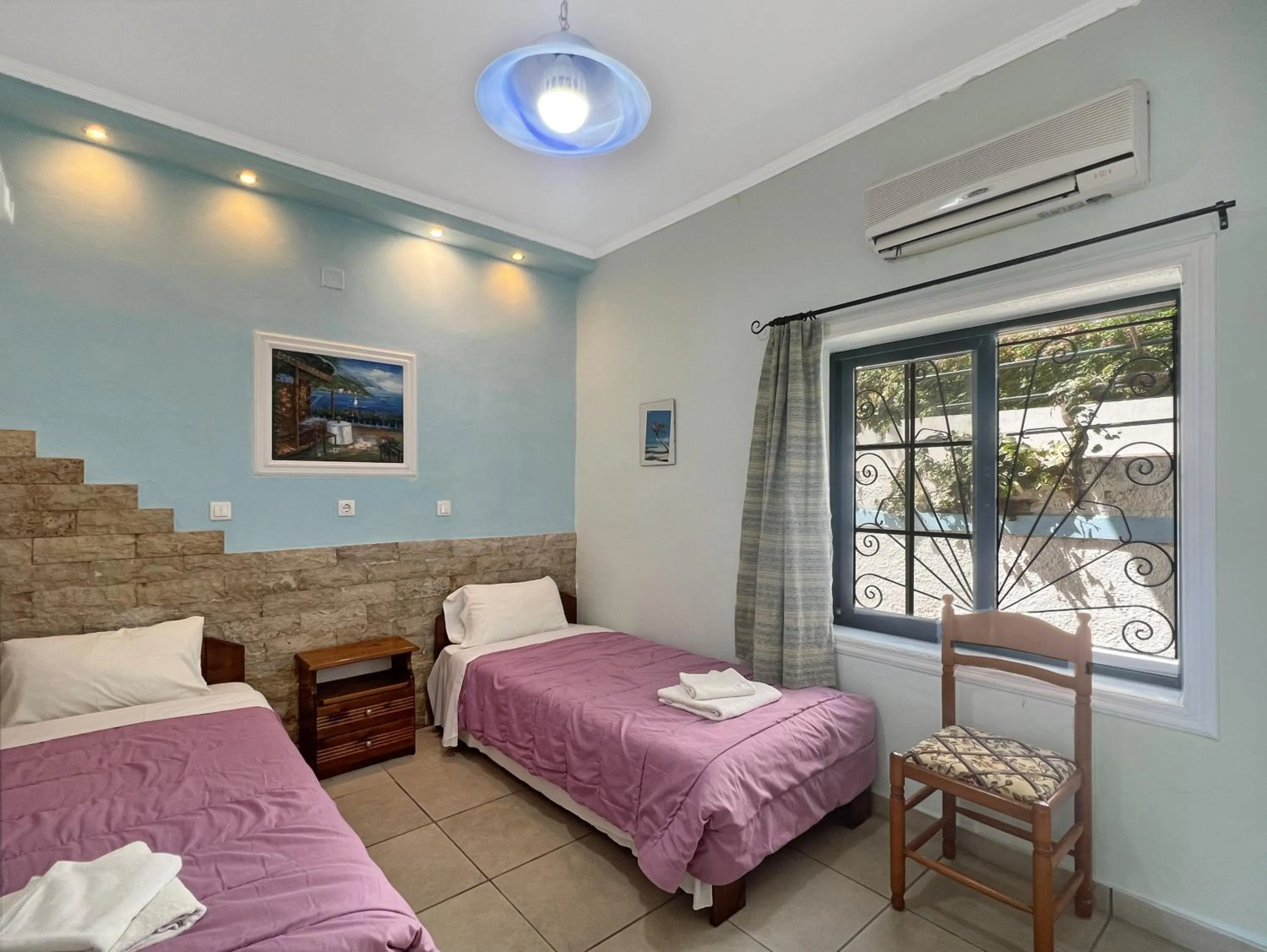 Bed in Corfu Andromaches Holiday Apartments