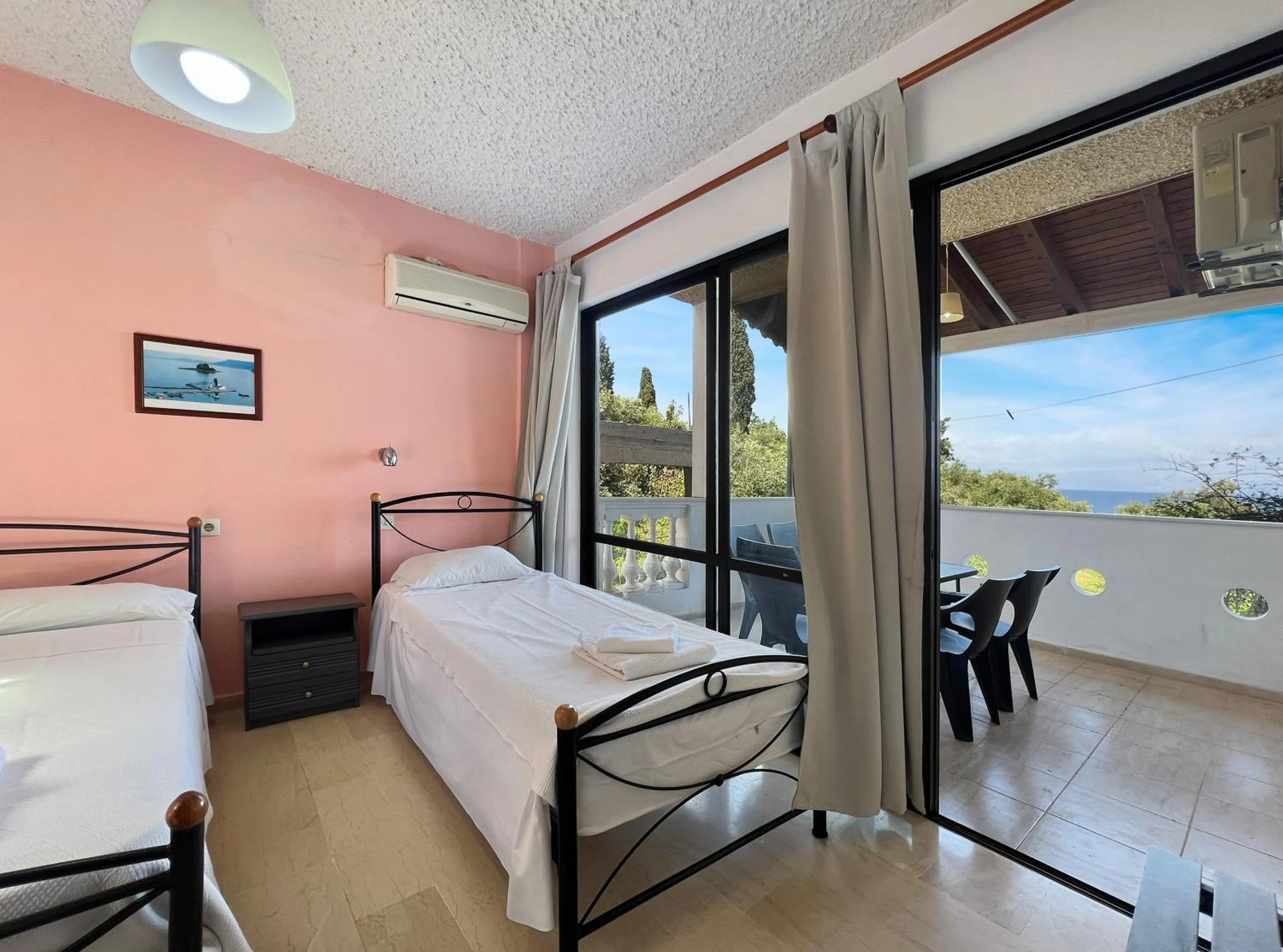 Bed in Corfu Andromaches Holiday Apartments