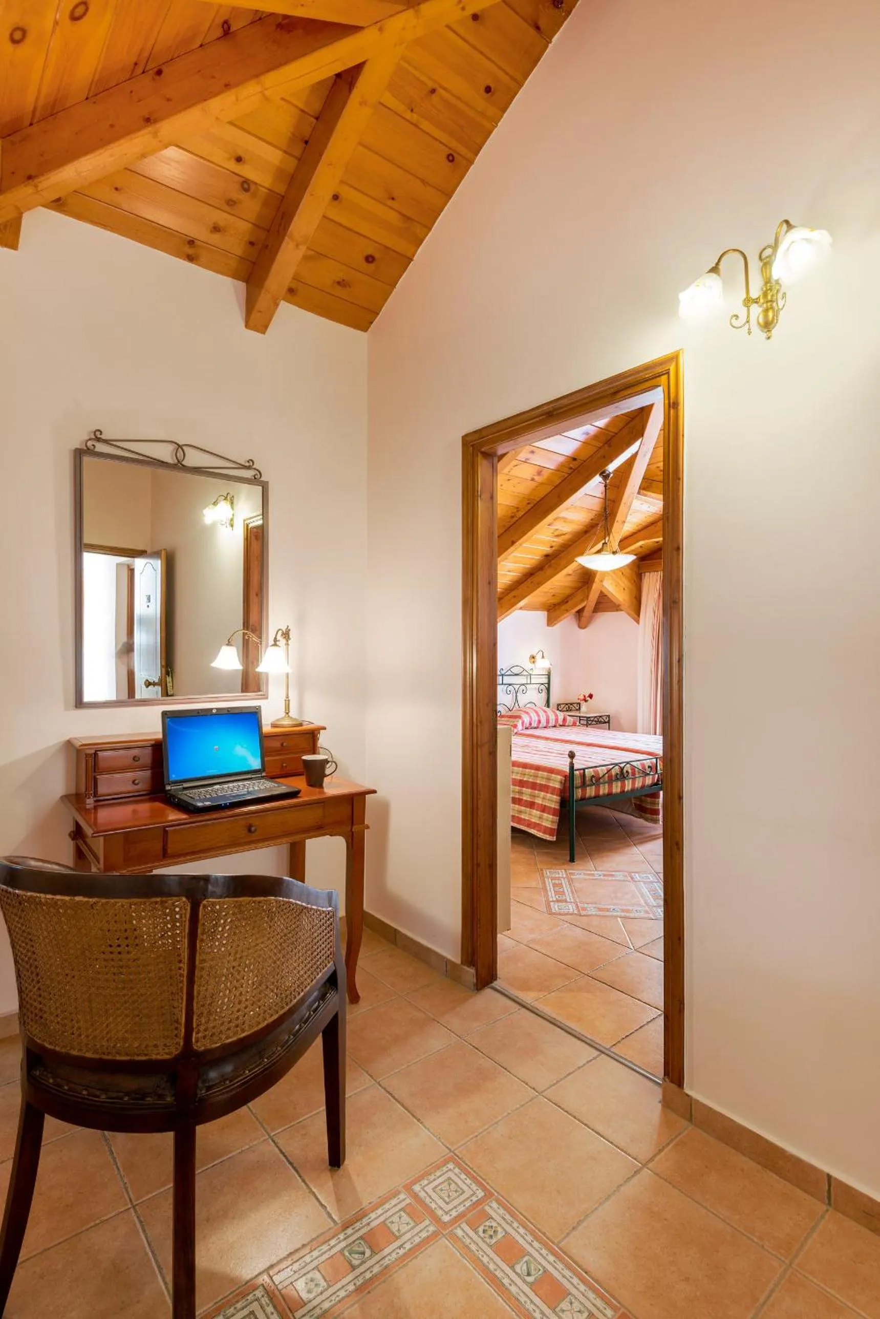 Seating area, Bed in Andreolas Luxury Suites