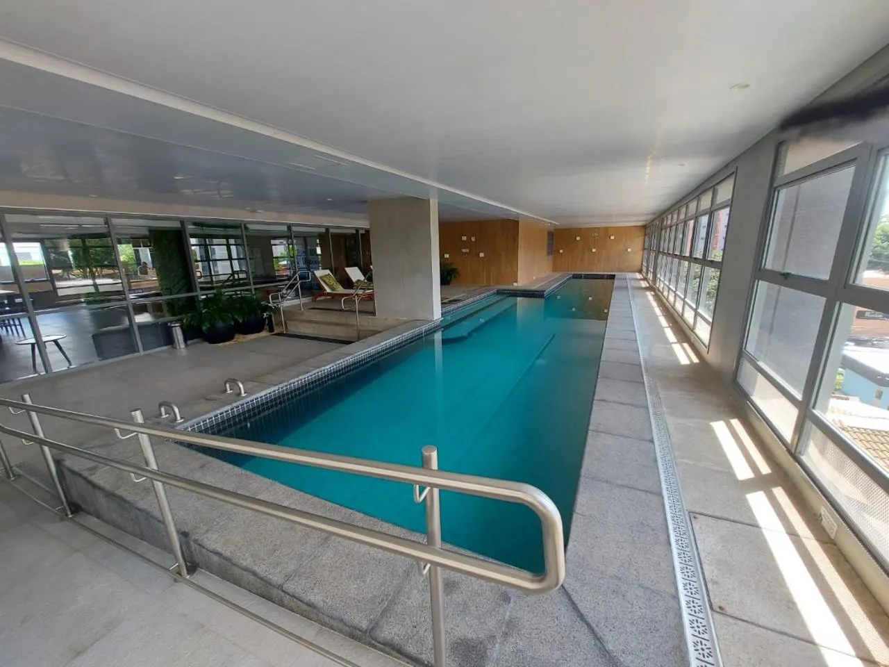 Swimming pool in Lindo studio em Moema