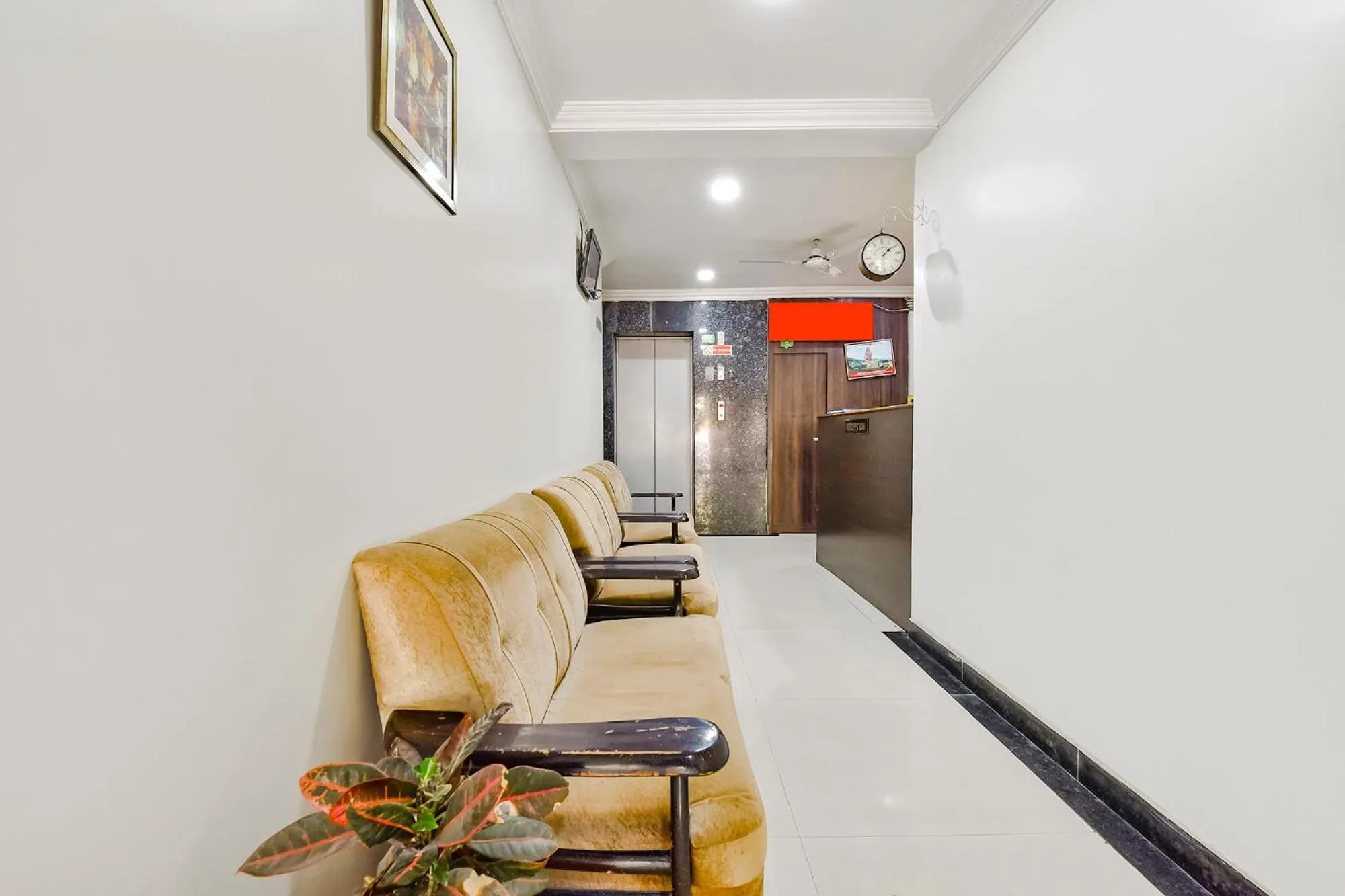 Seating area in FabExpress Golden Wings