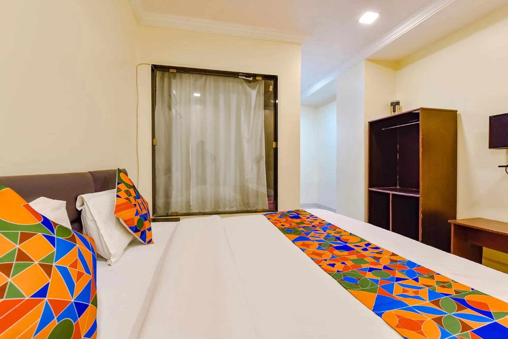 Communal lounge/ TV room, Bed in FabExpress Golden Wings