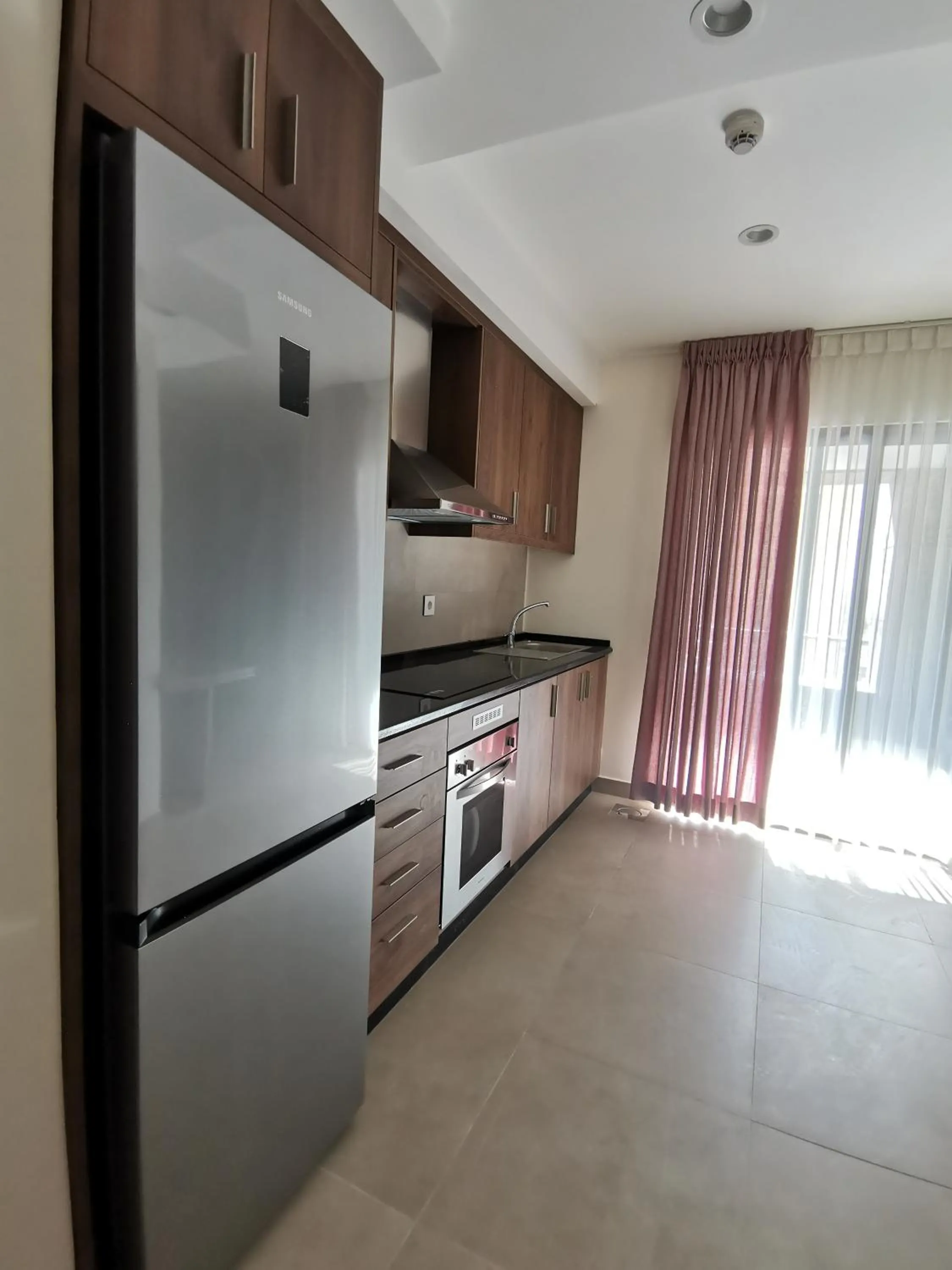 Kitchen or kitchenette in Dara apartment hotel