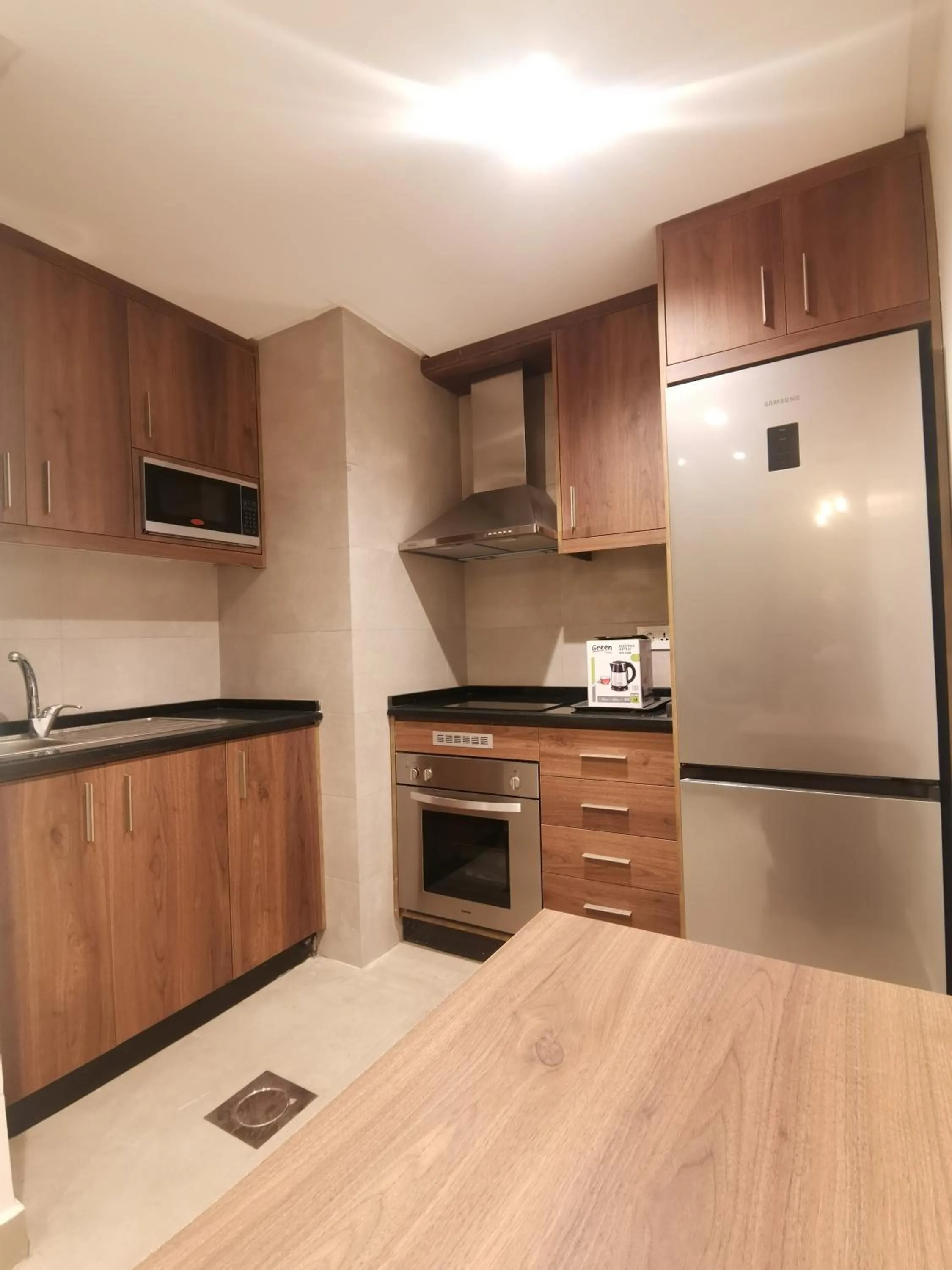 Kitchen or kitchenette in Dara apartment hotel