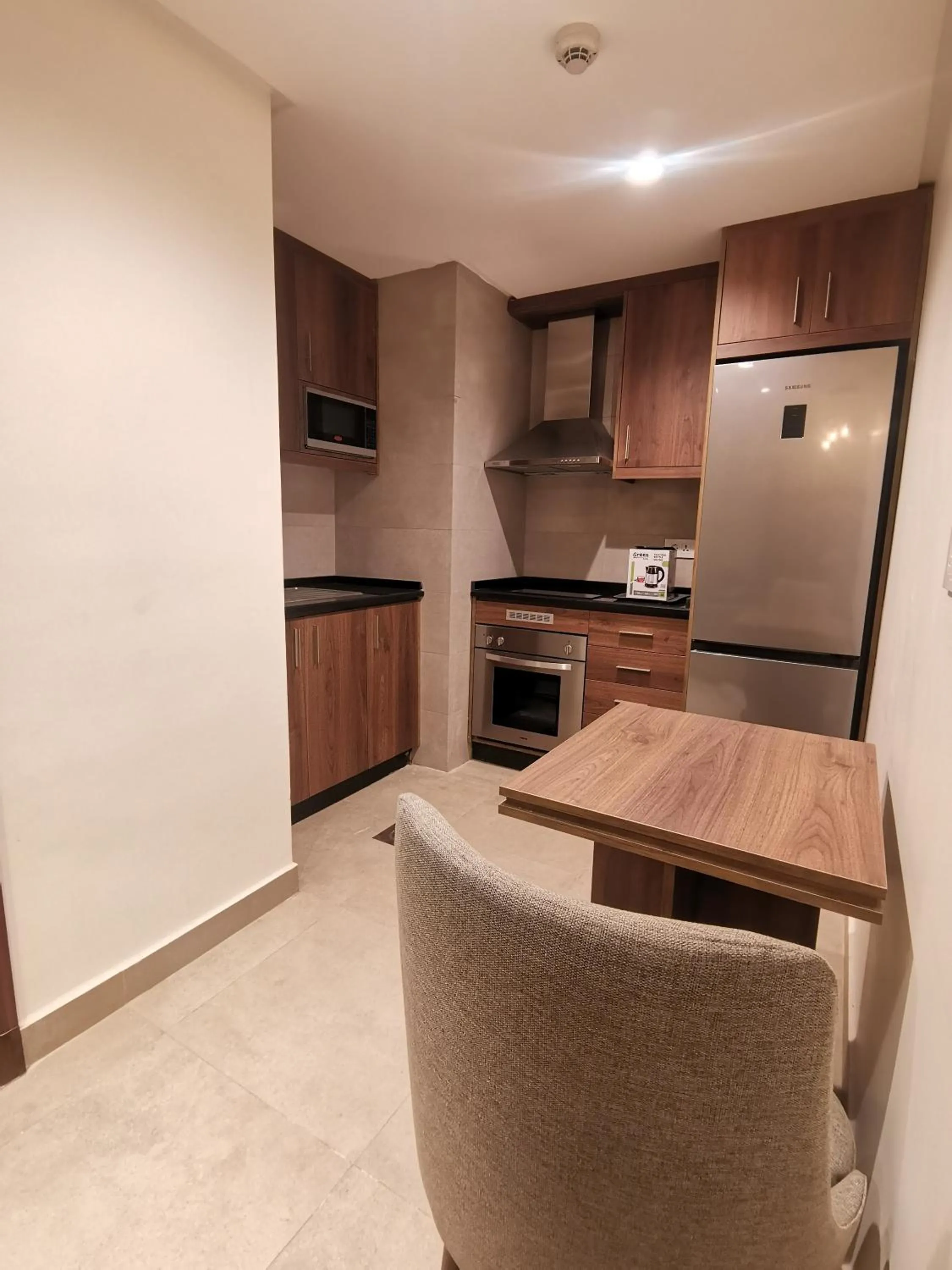Kitchen or kitchenette in Dara apartment hotel