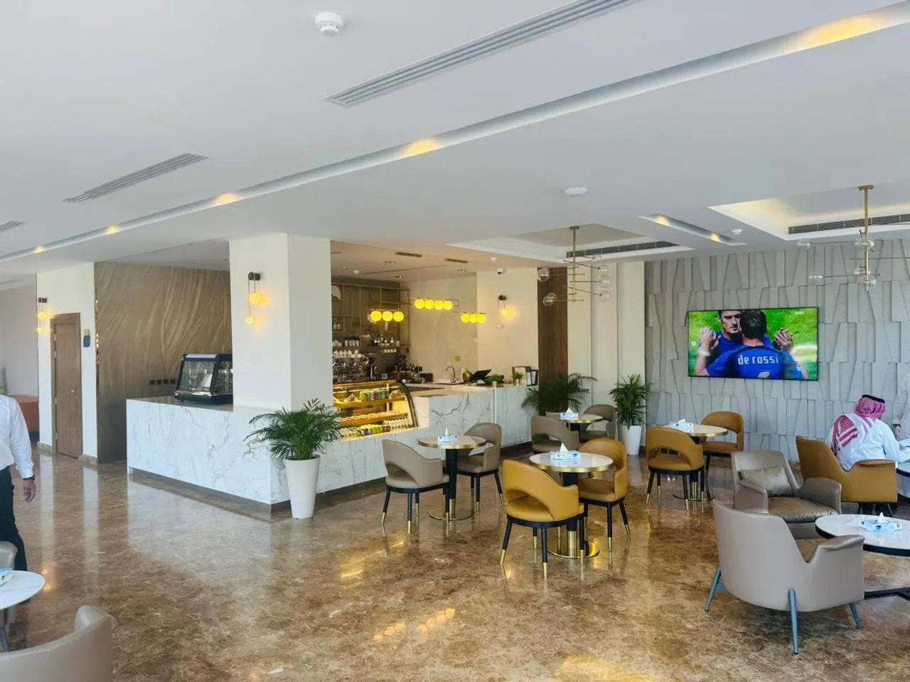 Lobby or reception in Al Ertiqaa Hotel