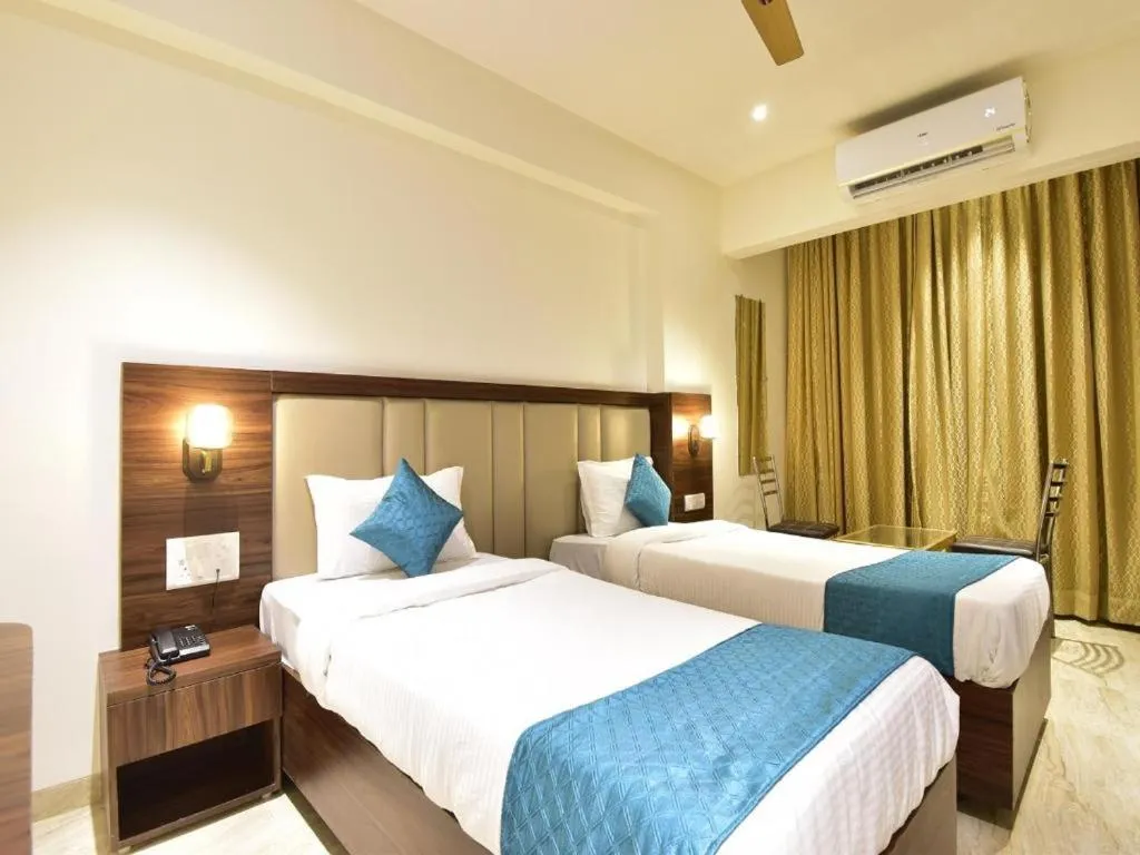 Bed in Hotel Candor Amigo Airoli Mind Space