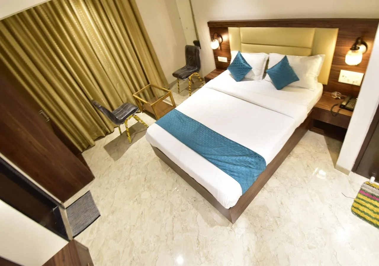 Bed in Hotel Candor Amigo Airoli Mind Space