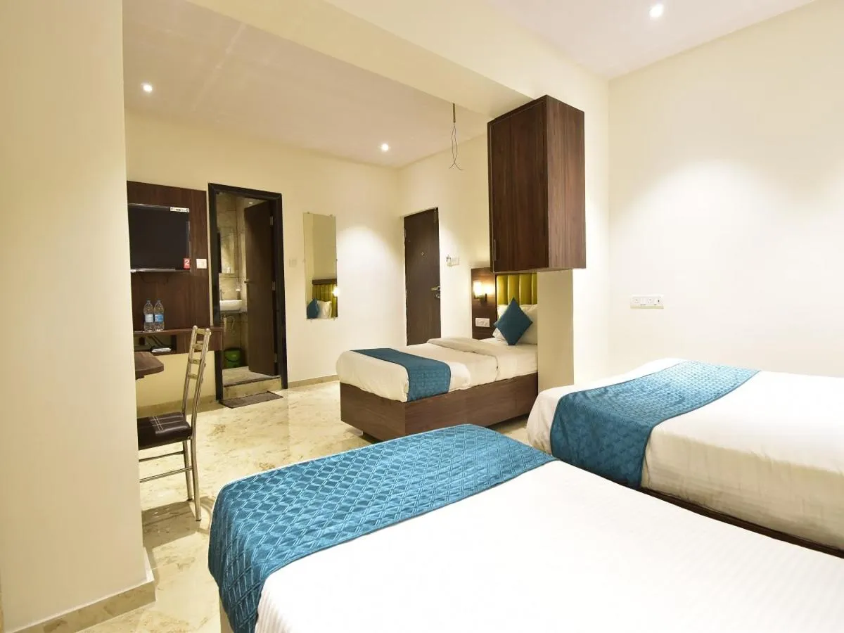 Bed in Hotel Candor Amigo Airoli Mind Space