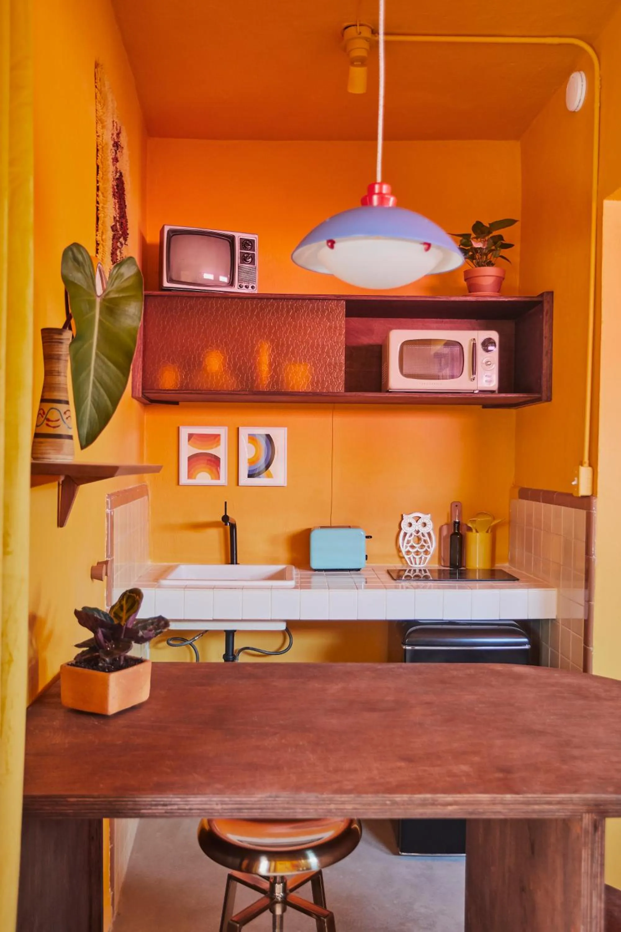 Kitchen or kitchenette in MOOD HAUS by DW - 70's Retro Stays