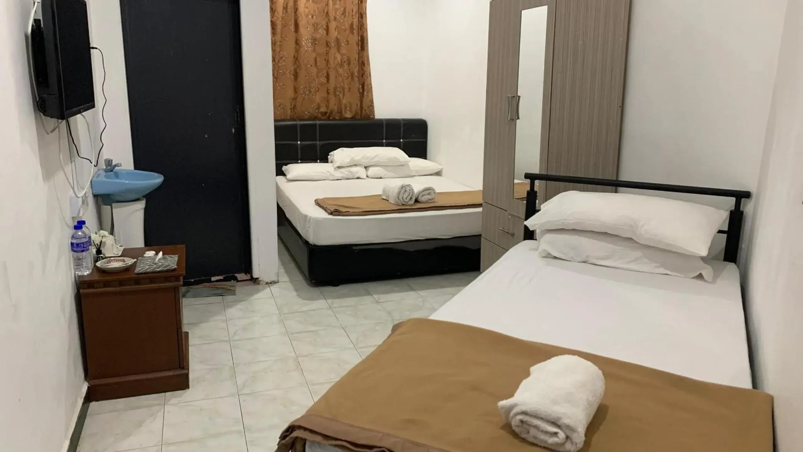 Bed in Raihan Beach Resort Bed in Raihan Beach Resort