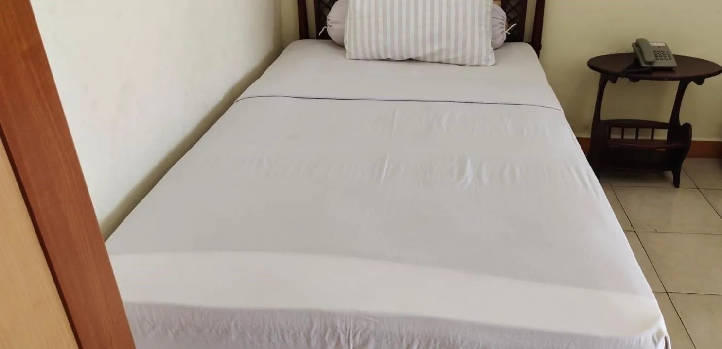 Bedroom in Hotel O Tris