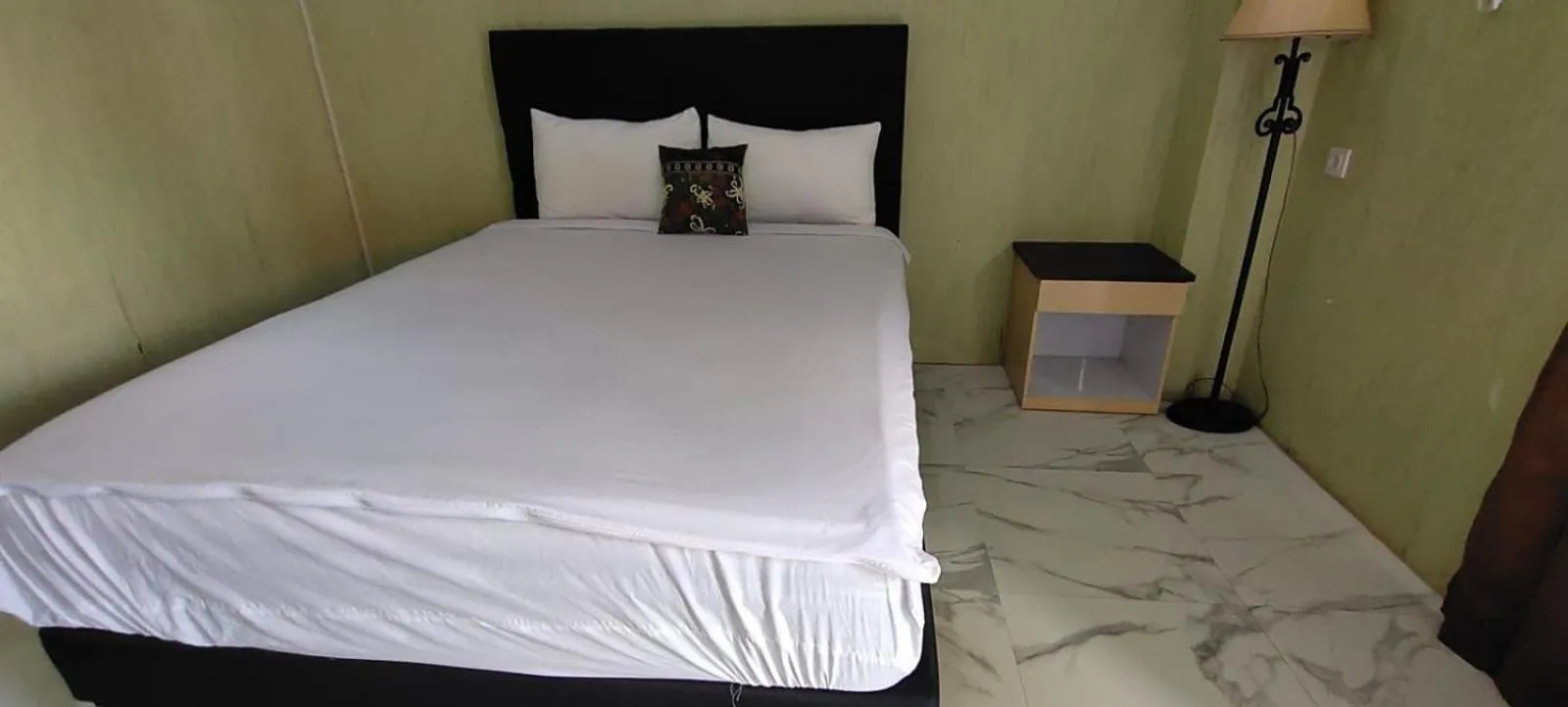 Bedroom in Hotel O Tris