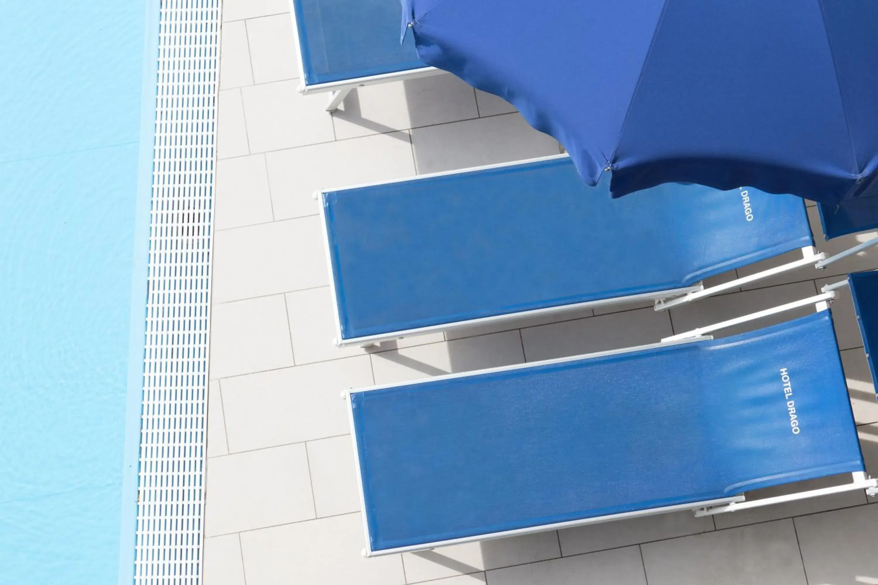 Solarium, Pool View in Hotel Drago