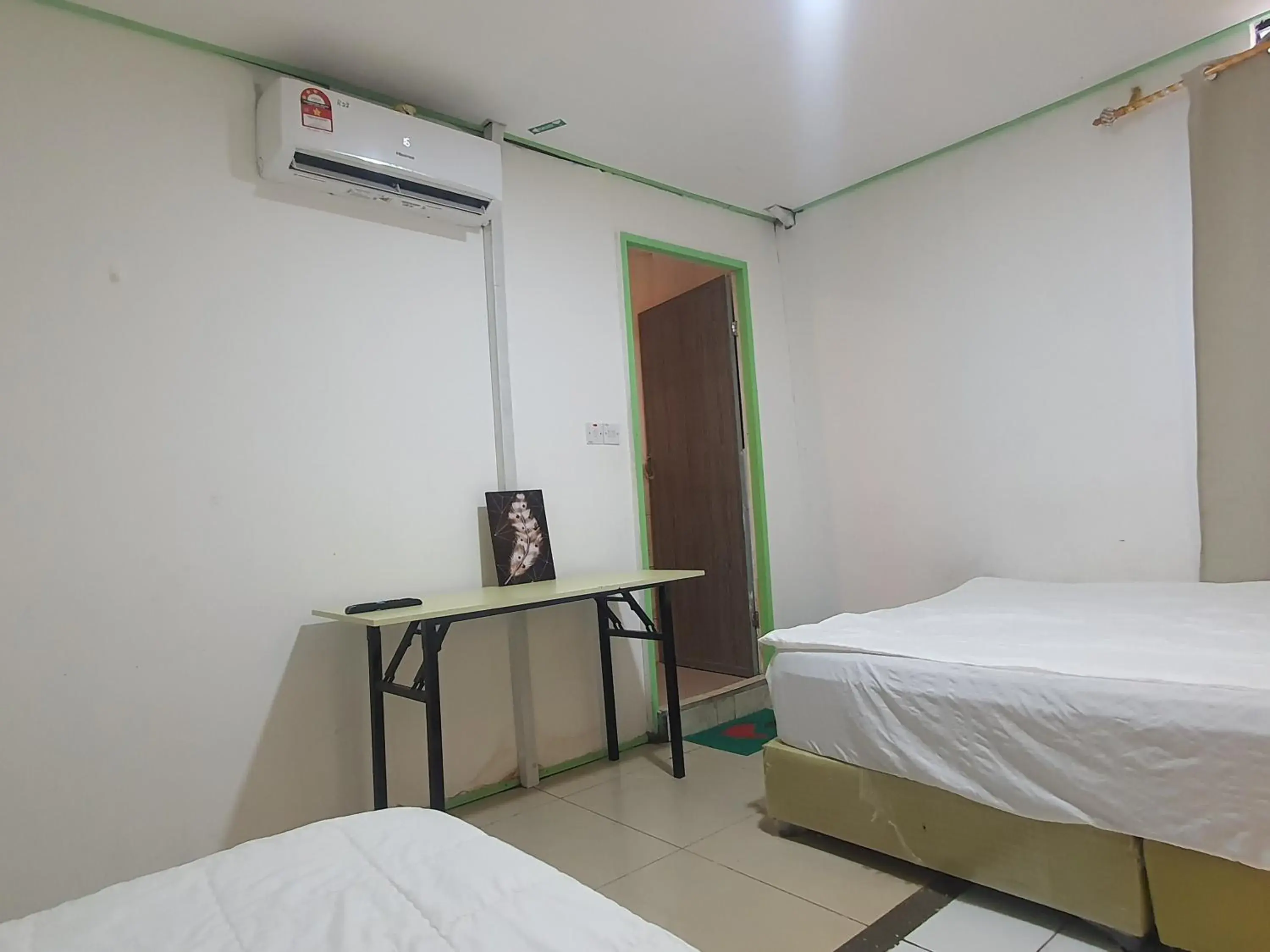 Bedroom, Bed in Hotel O Green Leaf Guest Lodge Kk Bedroom, Bed in Hotel O Green Leaf Guest Lodge Kk