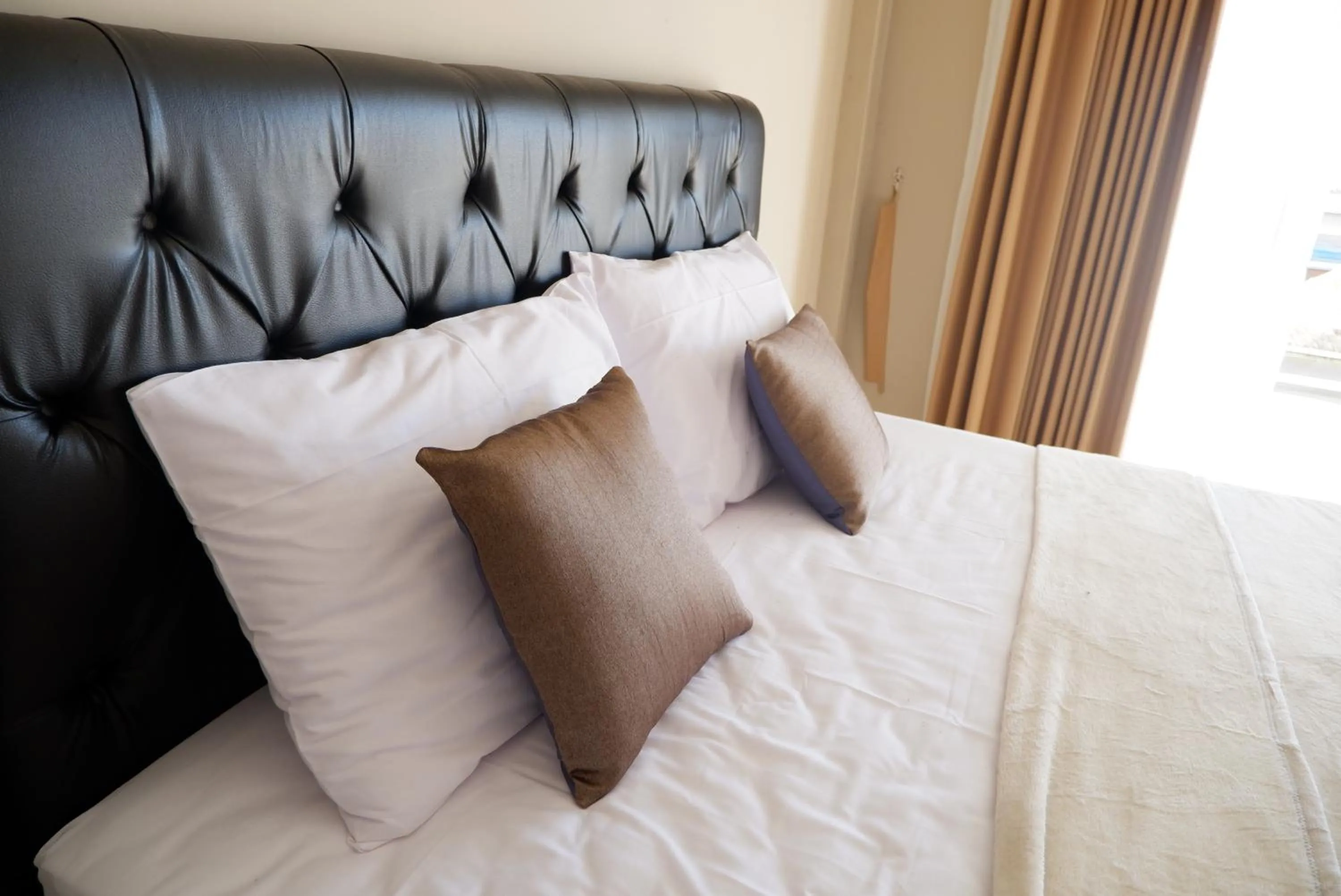 Bed in Gunza Bed and Breakfast